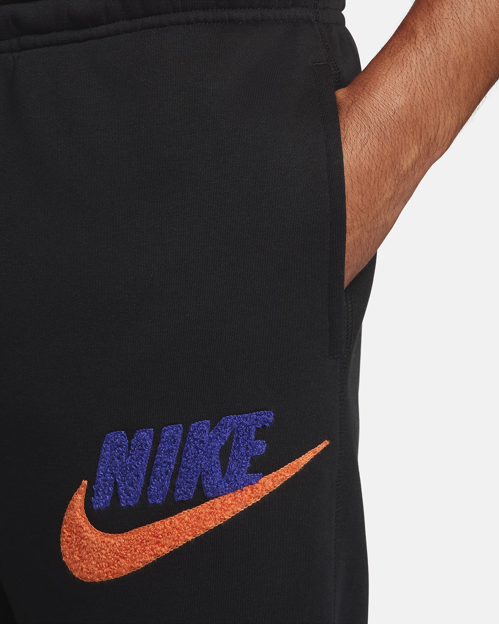 Ανδρικό φλις παντελόνι φόρμας Nike Club Fleece - Μαύρο/Μαύρο/Safety Orange