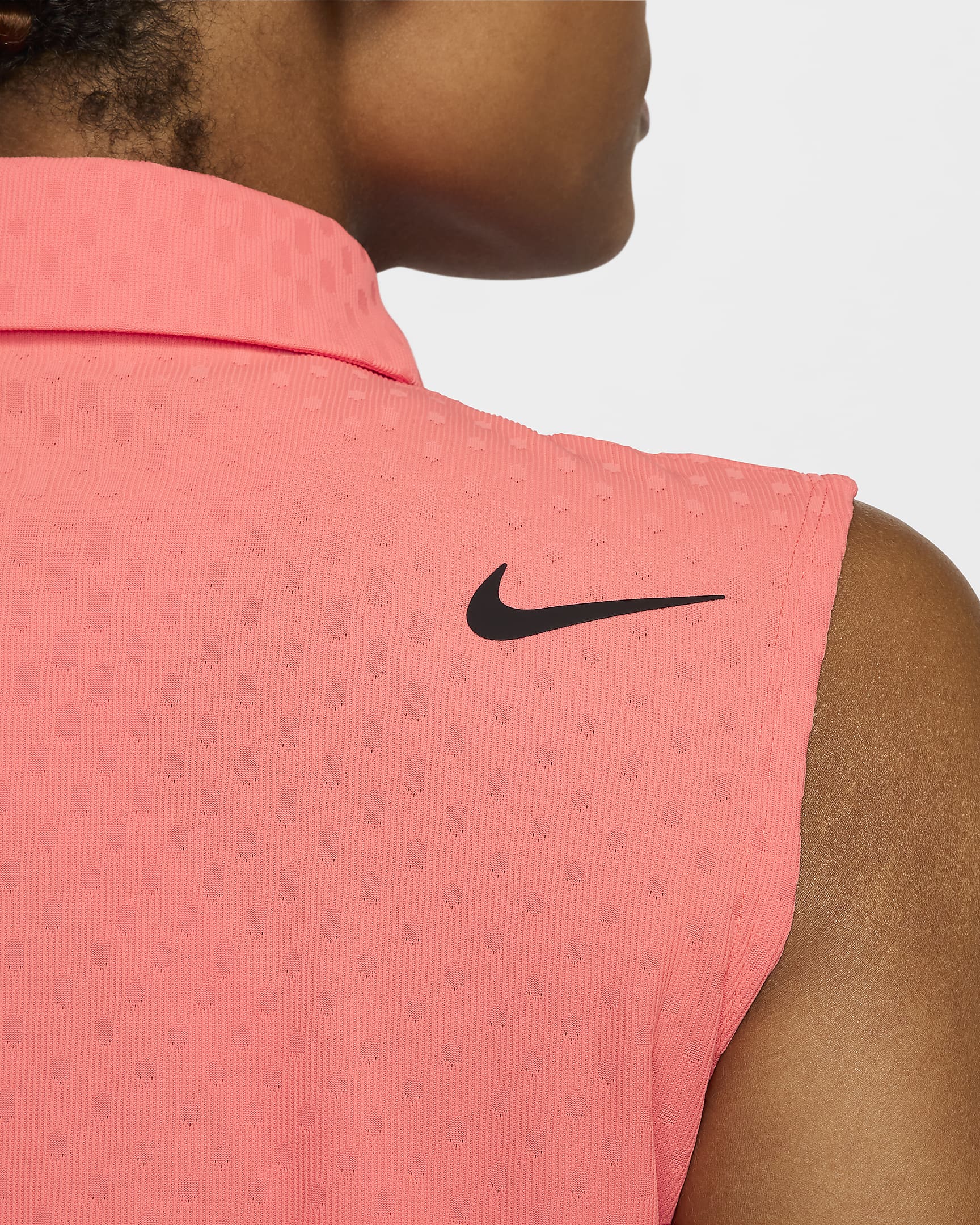 Polo de golf sans manches Dri-FIT ADV Nike Tour pour femme - Light Wild Mango/Noir