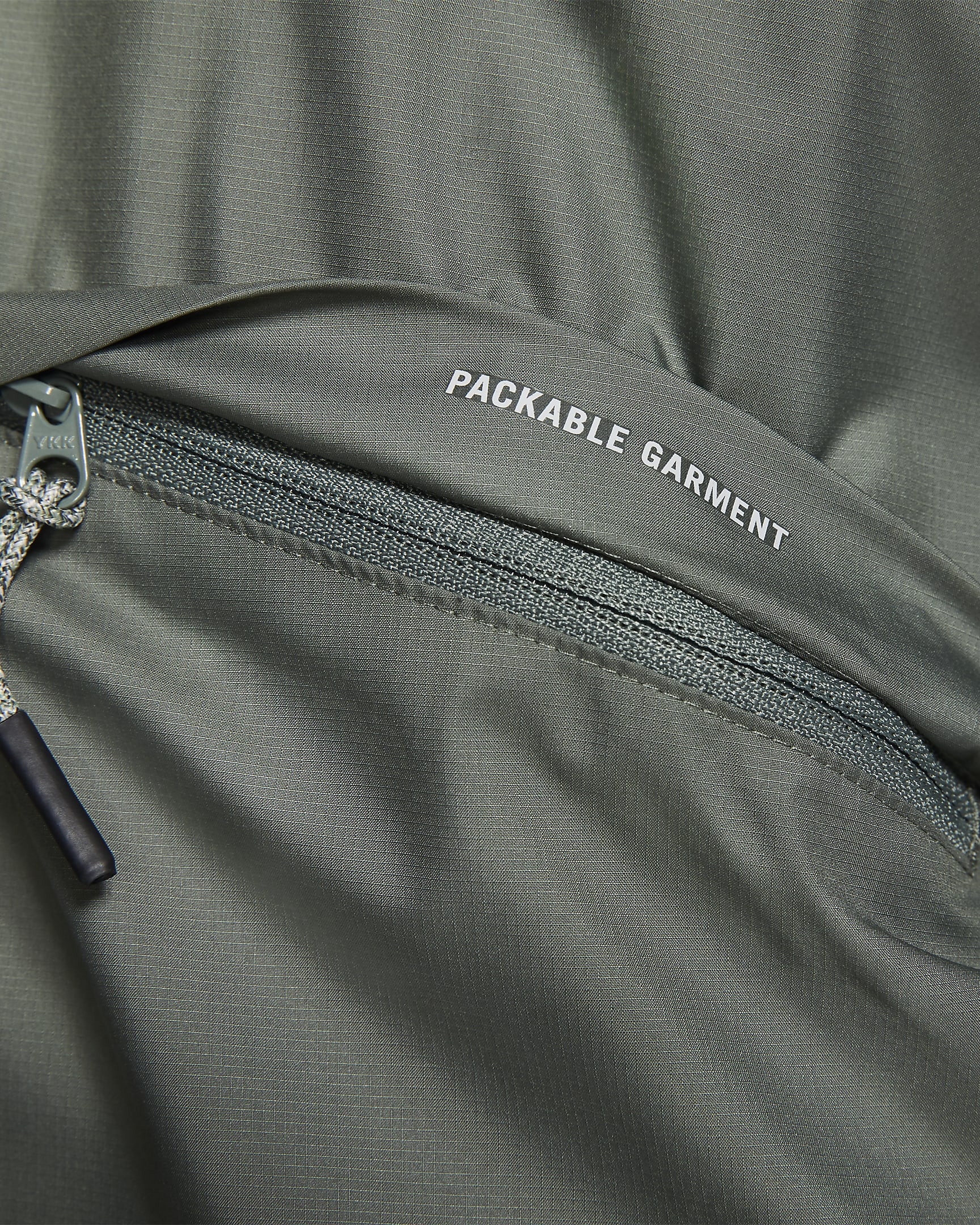 Nike Essential Women's Packable Running Rain Jacket.