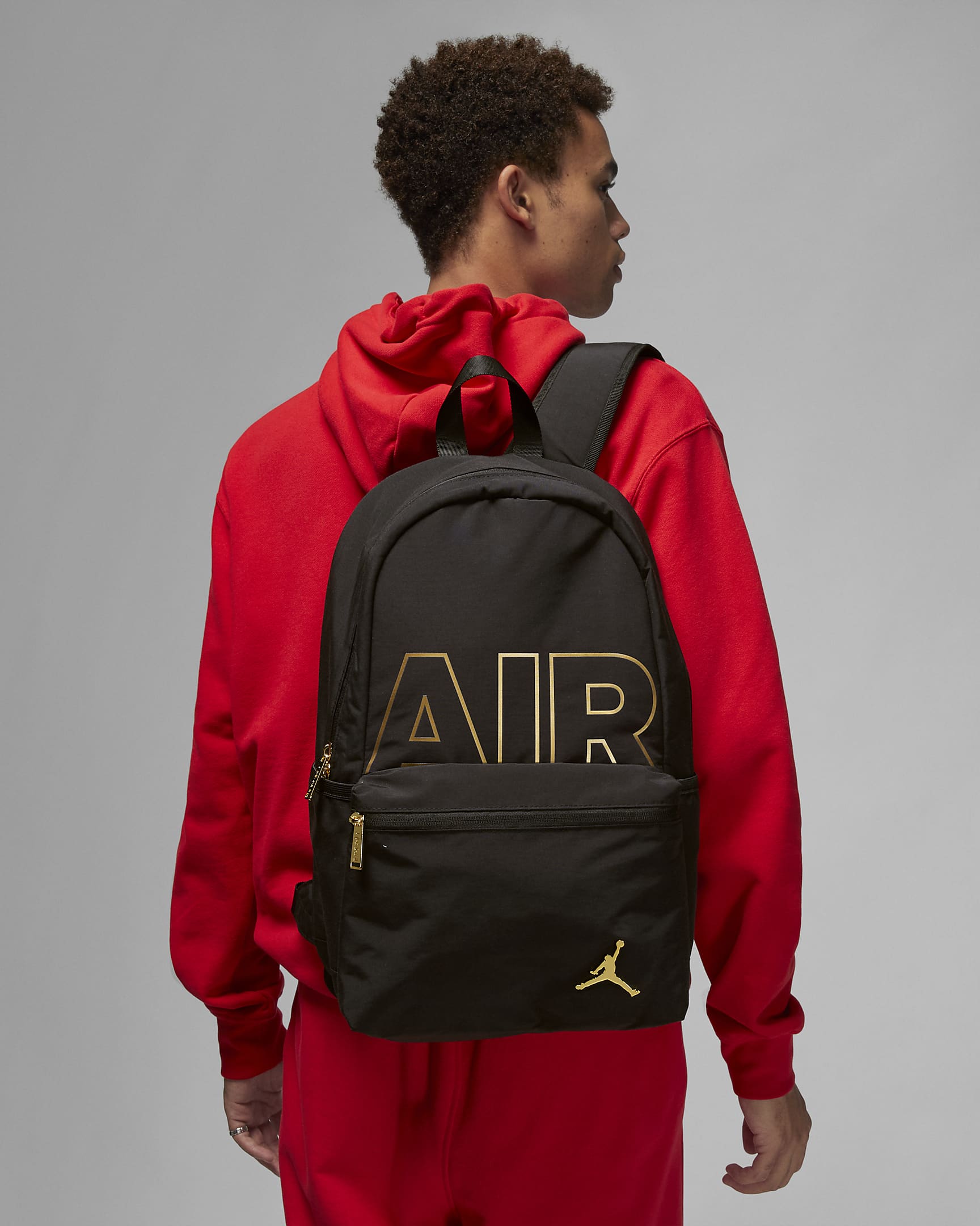 Jordan Black and Gold Backpack Backpack (19L). Nike HU
