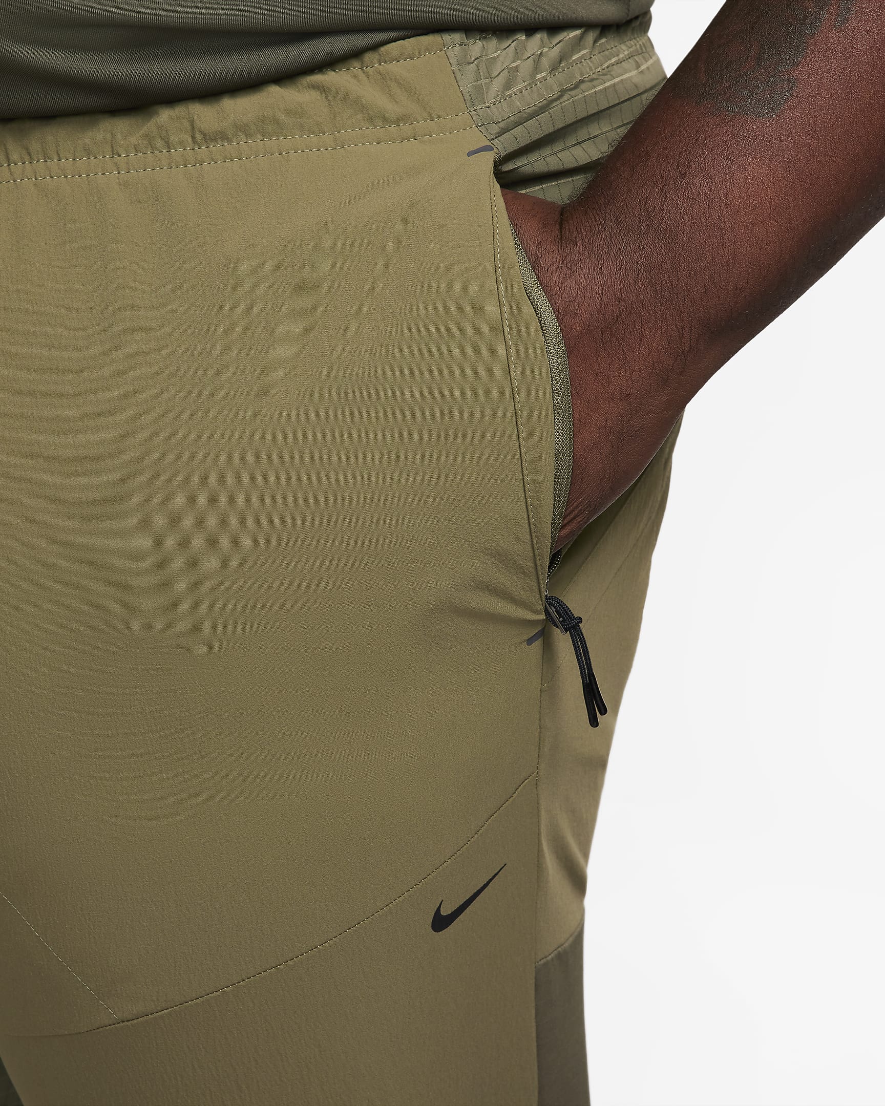 Nike APS Men's Dri-FIT ADV Woven Versatile Trousers. Nike IL