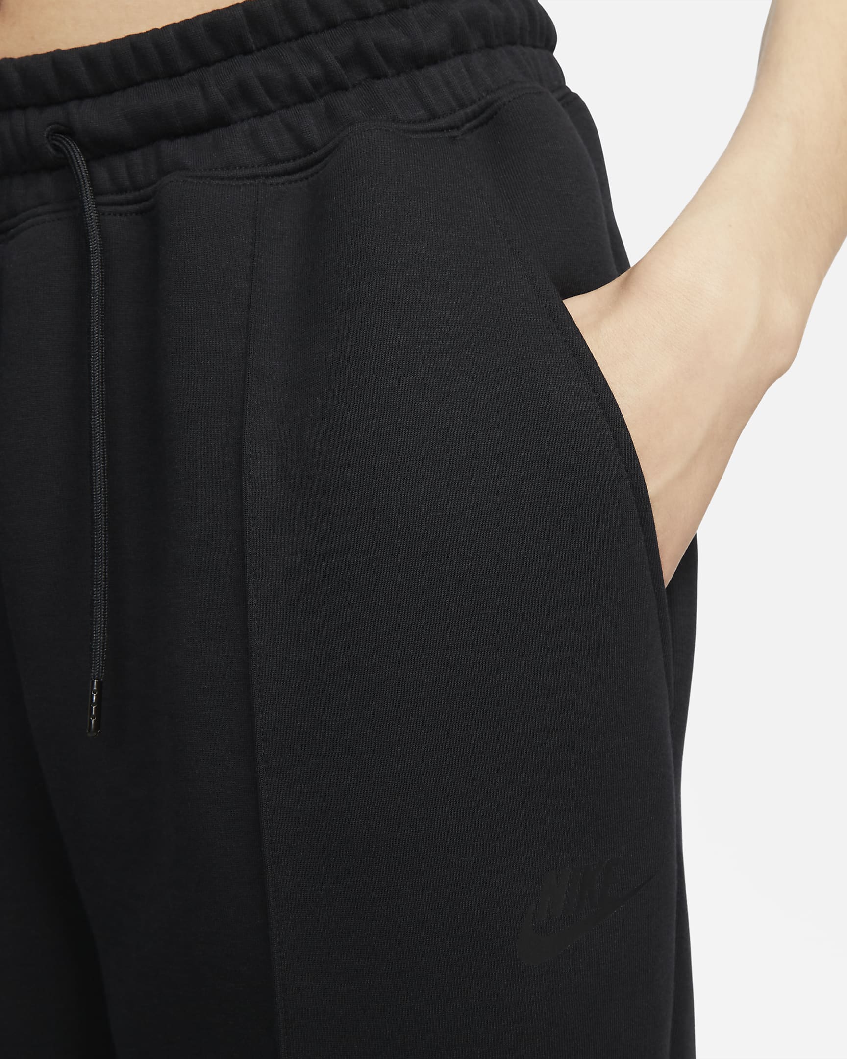 Joggingbyxor Nike Sportswear Tech Fleece med medelhög midja för kvinnor - Svart/Svart