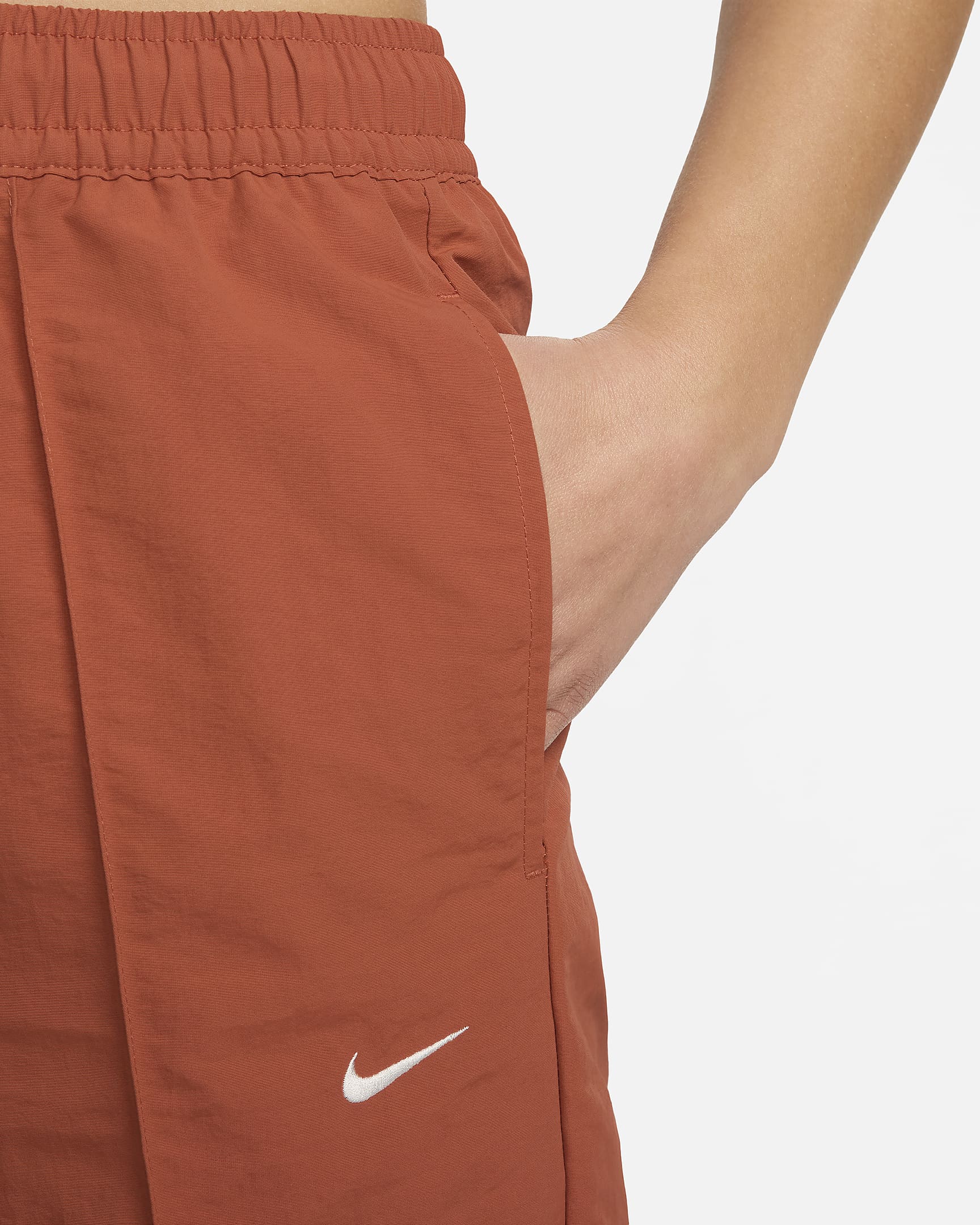 Pants de tiro medio con dobladillo abierto para mujer Nike Sportswear Everything Wovens - Amanecer quemado/Vela