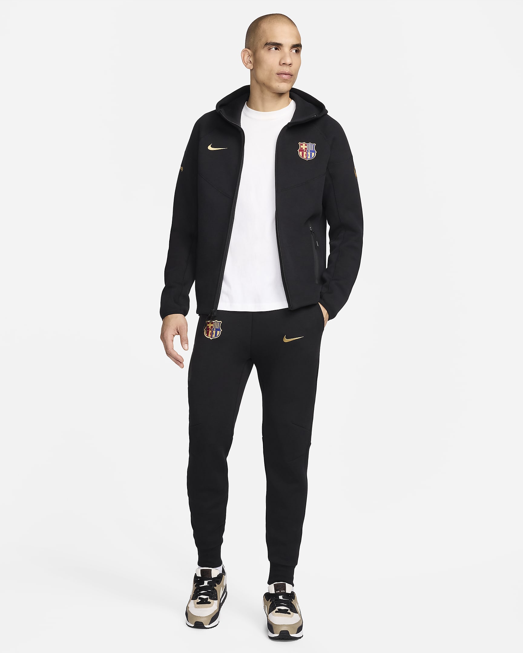 Calças desportivas de futebol Nike Tech Fleece FC Barcelona para homem - Preto/Dourado Club