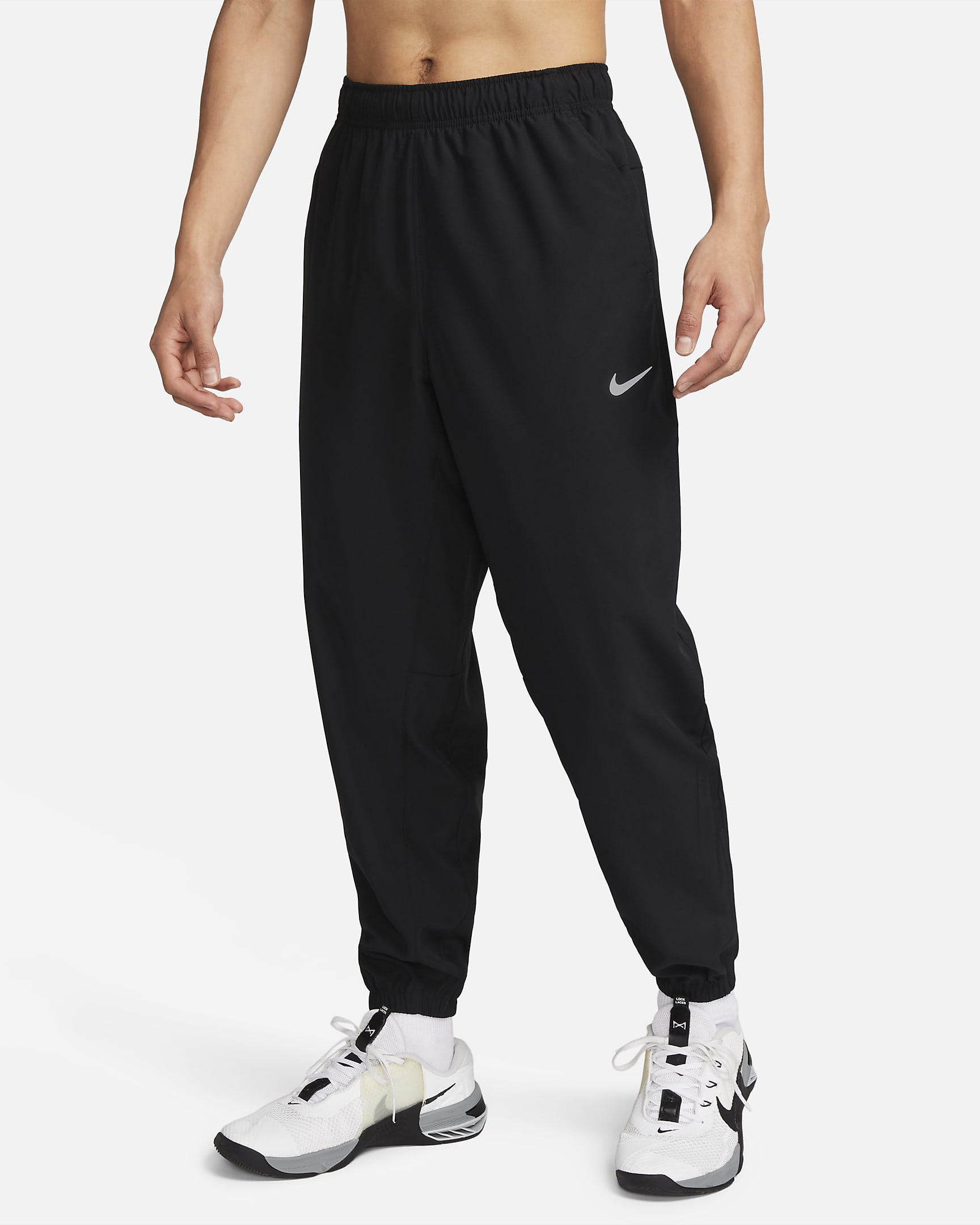 Nike Form Men's Dri-FIT Tapered Versatile Trousers. Nike AU