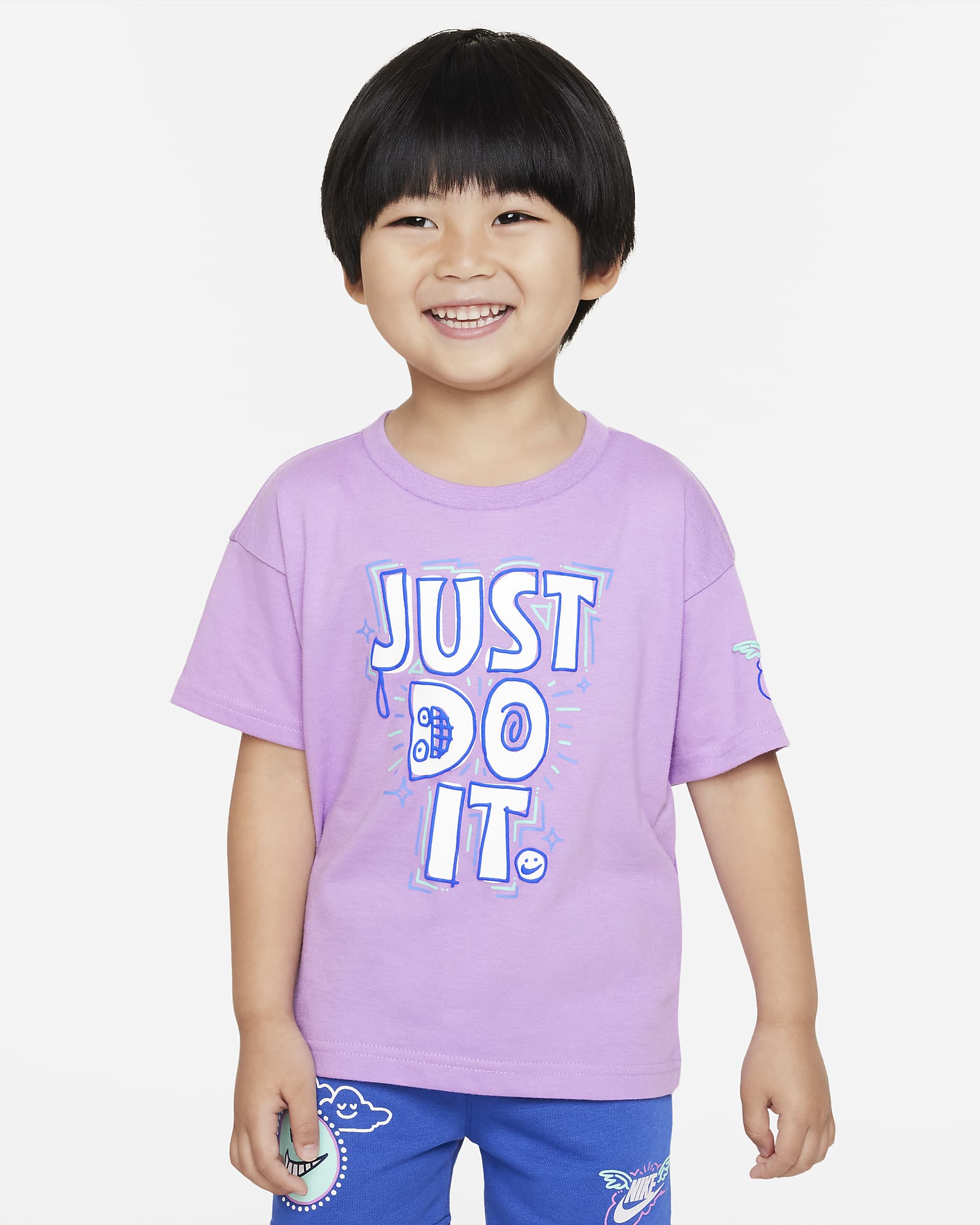 Playera infantil holgada con gráfico Nike Sportswear "Art of Play