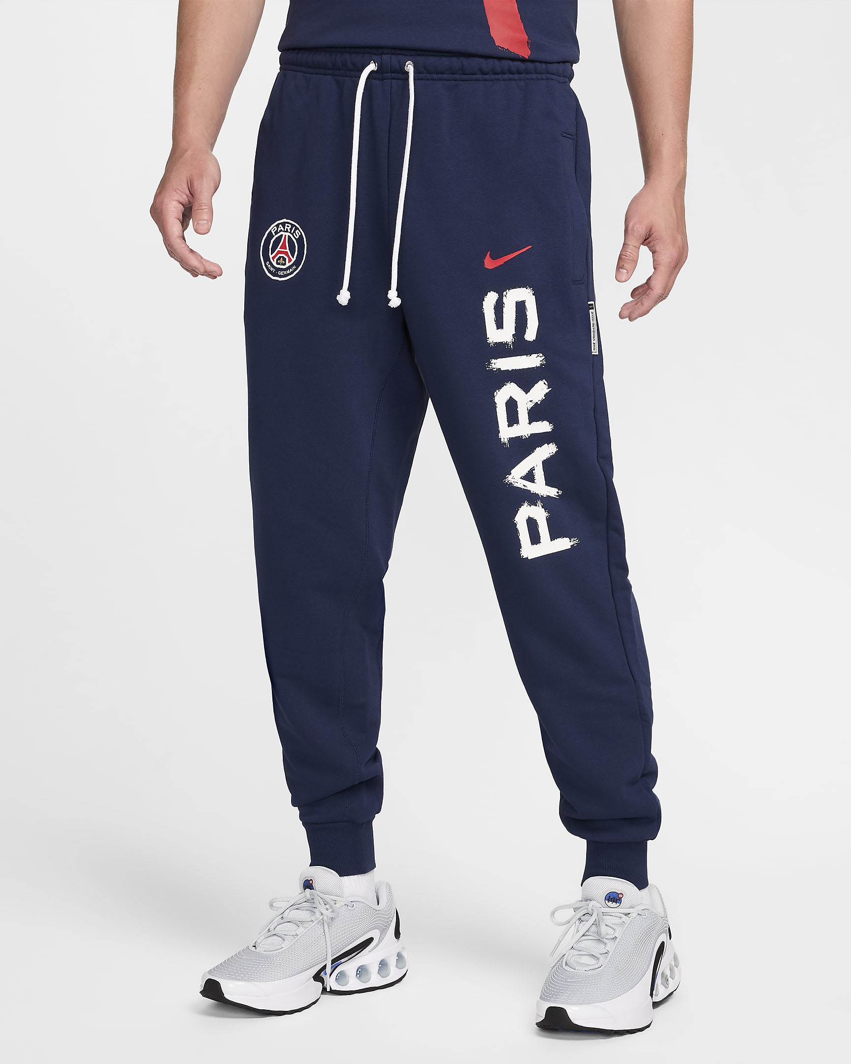 Pantalon de foot fuselé Nike Dri-FIT Paris Saint-Germain Standard Issue pour homme - Midnight Navy/University Red