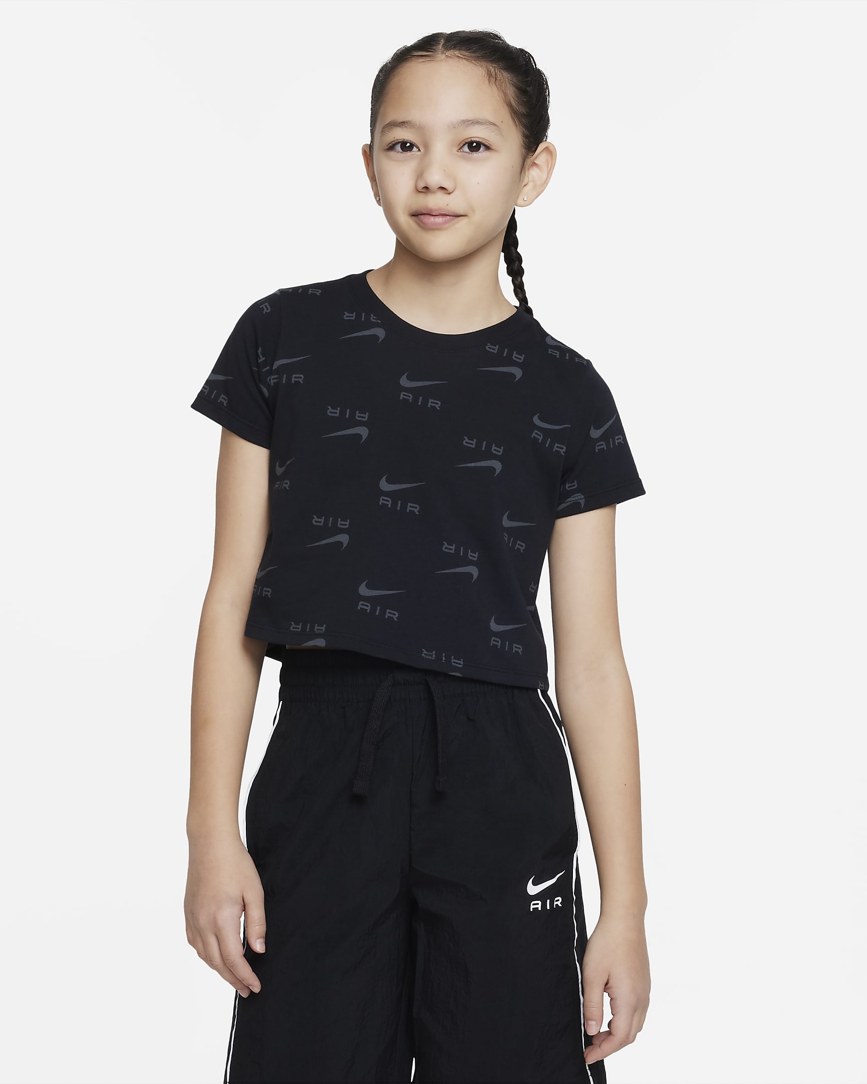 เสื้อยืดเอวลอยเด็กโต Nike Air (หญิง) - ดำ