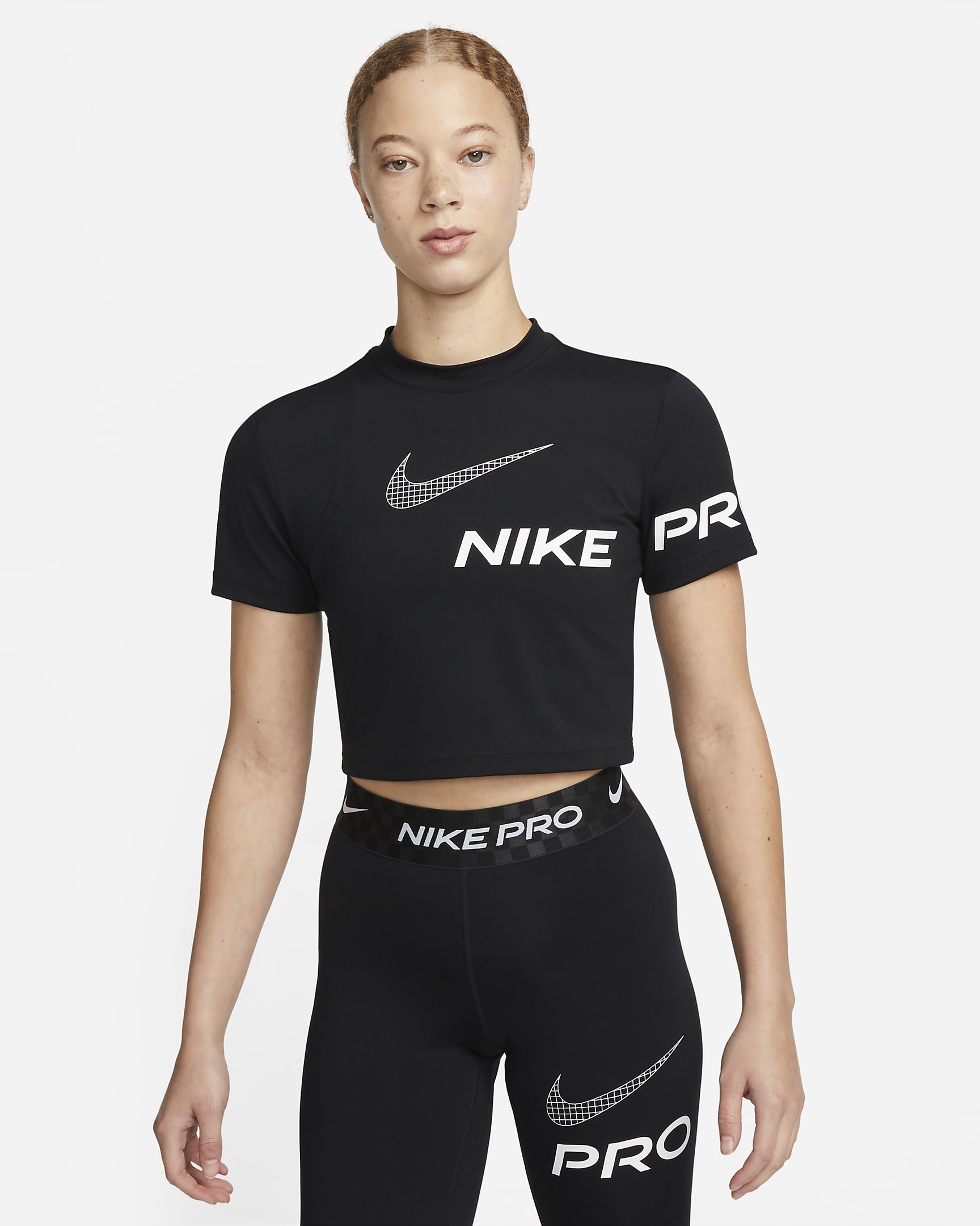 Kort Nike Pro Dri-FIT-træningsoverdel med korte ærmer og grafik til kvinder - sort/hvid