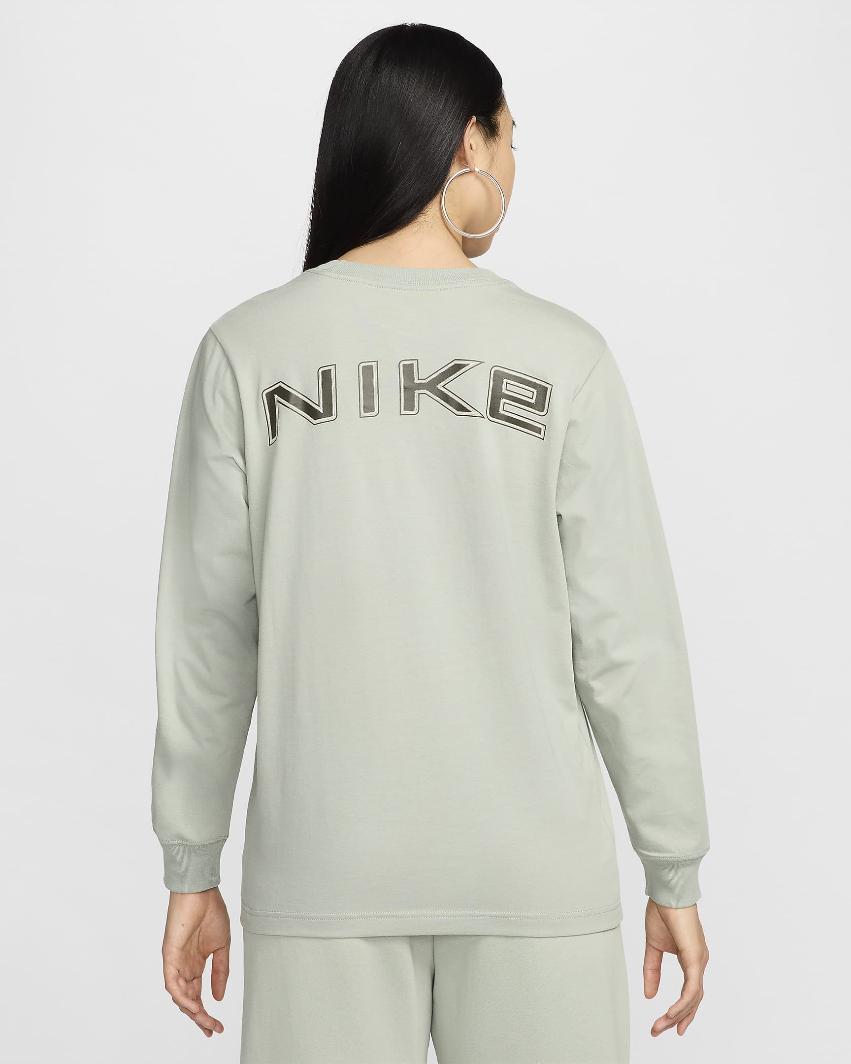 เสื้อยืดแขนยาวทรงหลวมผู้หญิง Nike Sportswear - Jade Horizon