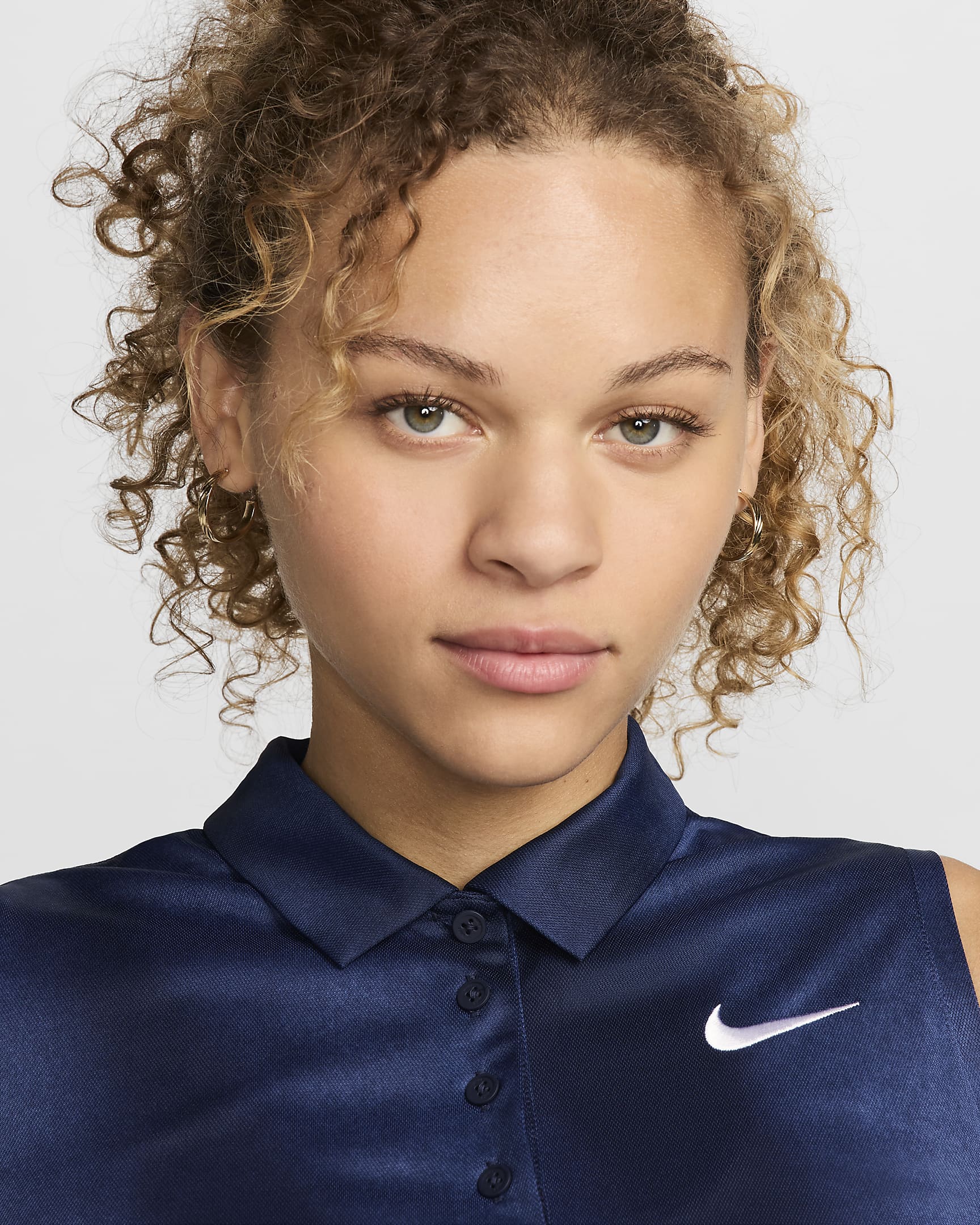 Nike Victory Dri-FIT mouwloze golfpolo met print voor dames - Mystic Navy/Obsidian/Wit