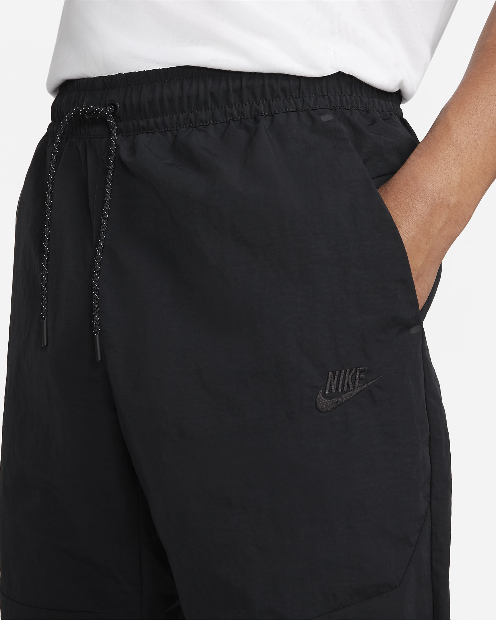 Nike Sportswear Tech Essentials Men's lined Commuter Pants.