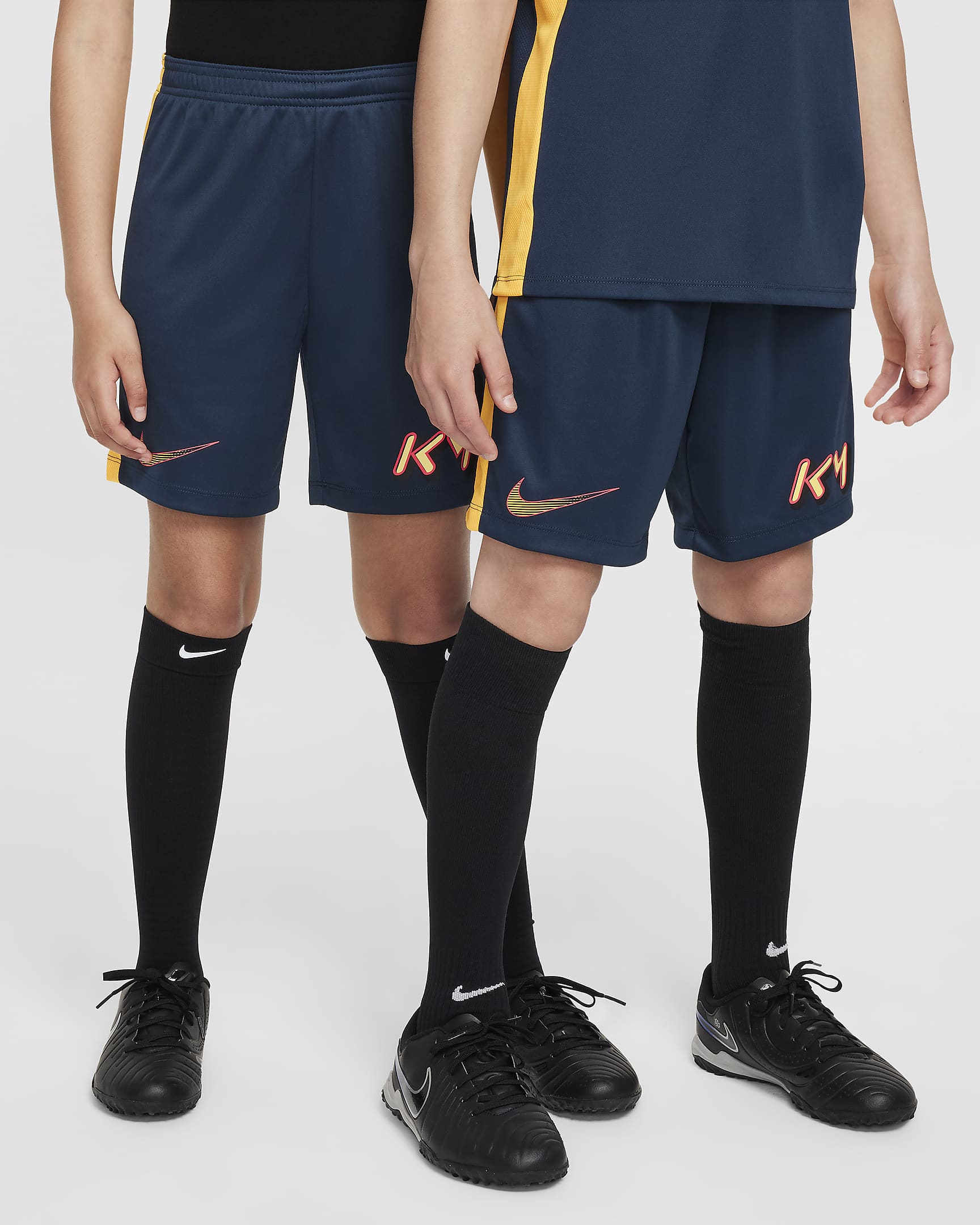 กางเกงฟุตบอลขาสั้นเด็กโต Dri-FIT Kylian Mbappé Academy23 - Armory Navy/Laser Orange