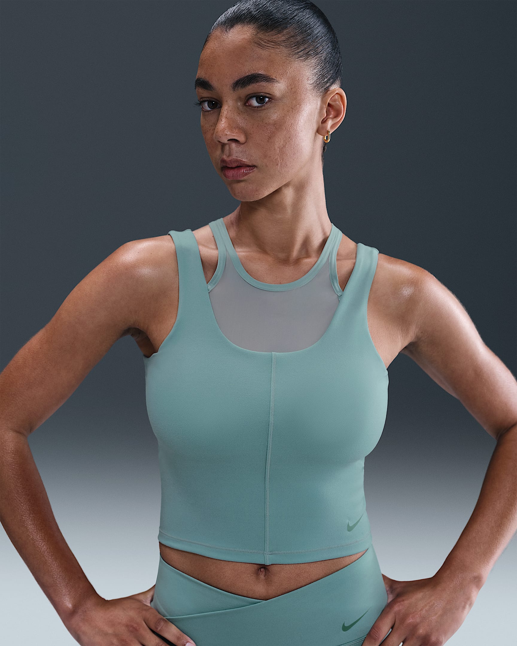 Nike One Fitted cropped tanktop met Dri-FIT voor dames - Cannon/Bicoastal