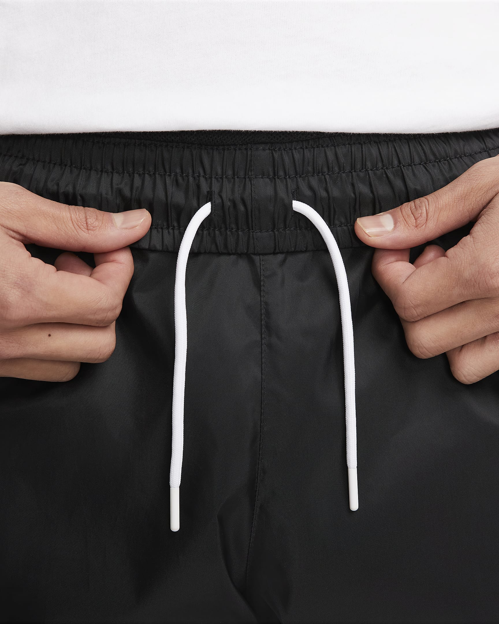 Nike Windrunner Men's Woven Lined Trousers. Nike IN