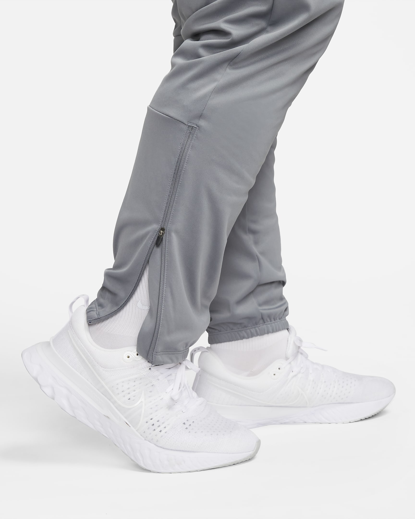 Nike Dri-FIT Challenger Men's Knit Running Trousers. Nike AT