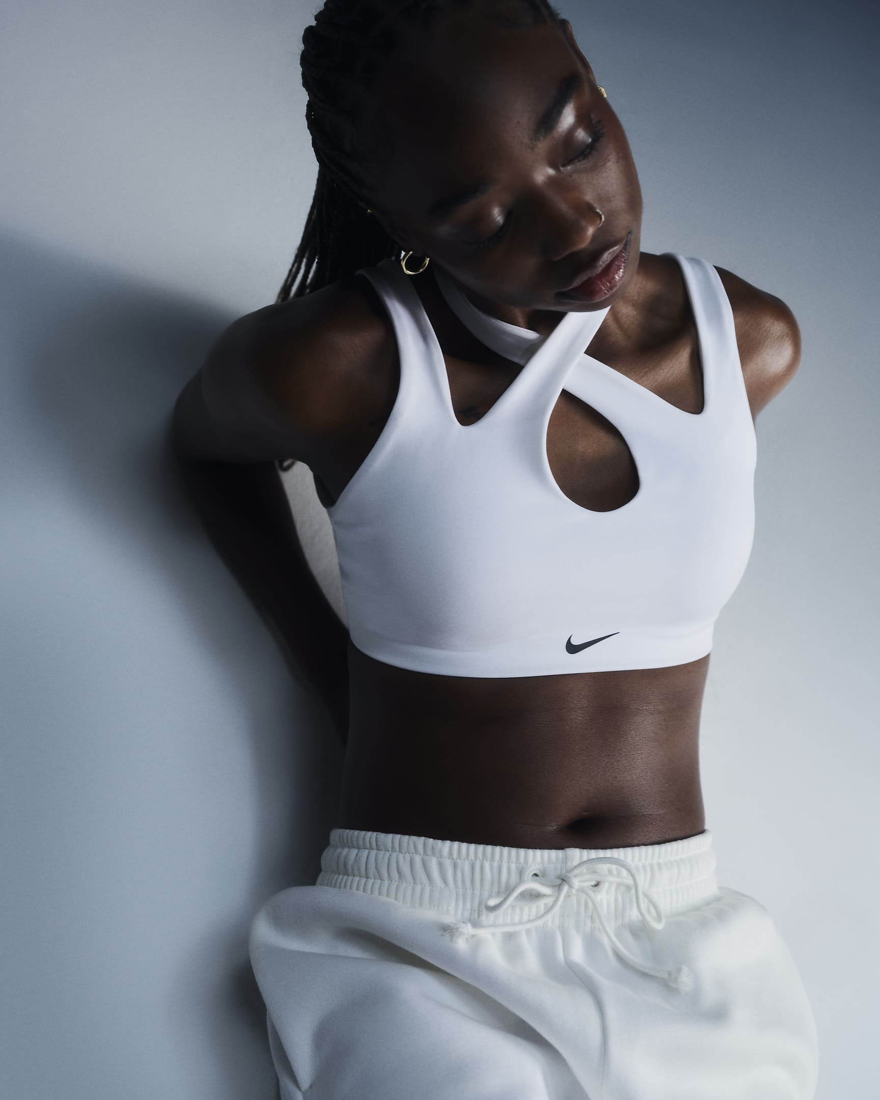 Bra deportivo con almohadillas de baja sujeción para mujer Nike Freestyle - Blanco/Negro