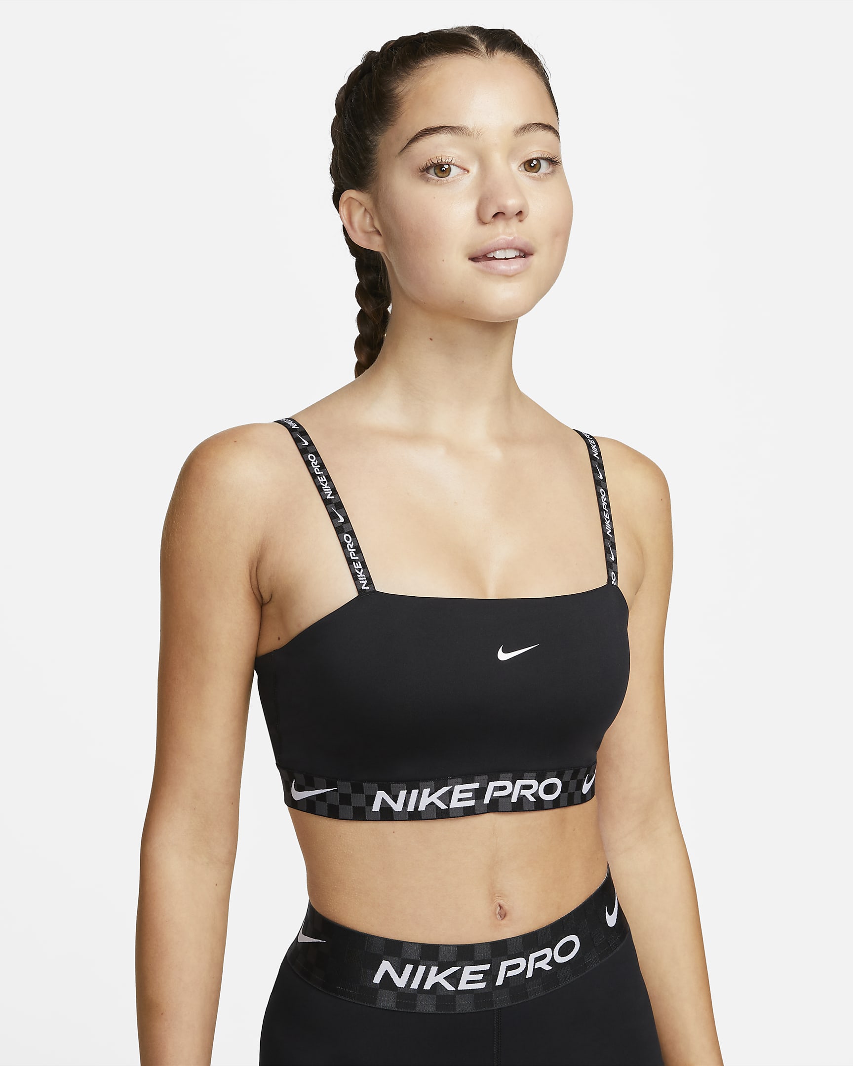 Nike Pro Indy Bandeau-Sport-BH mit leichtem Halt und Polster. Nike CH