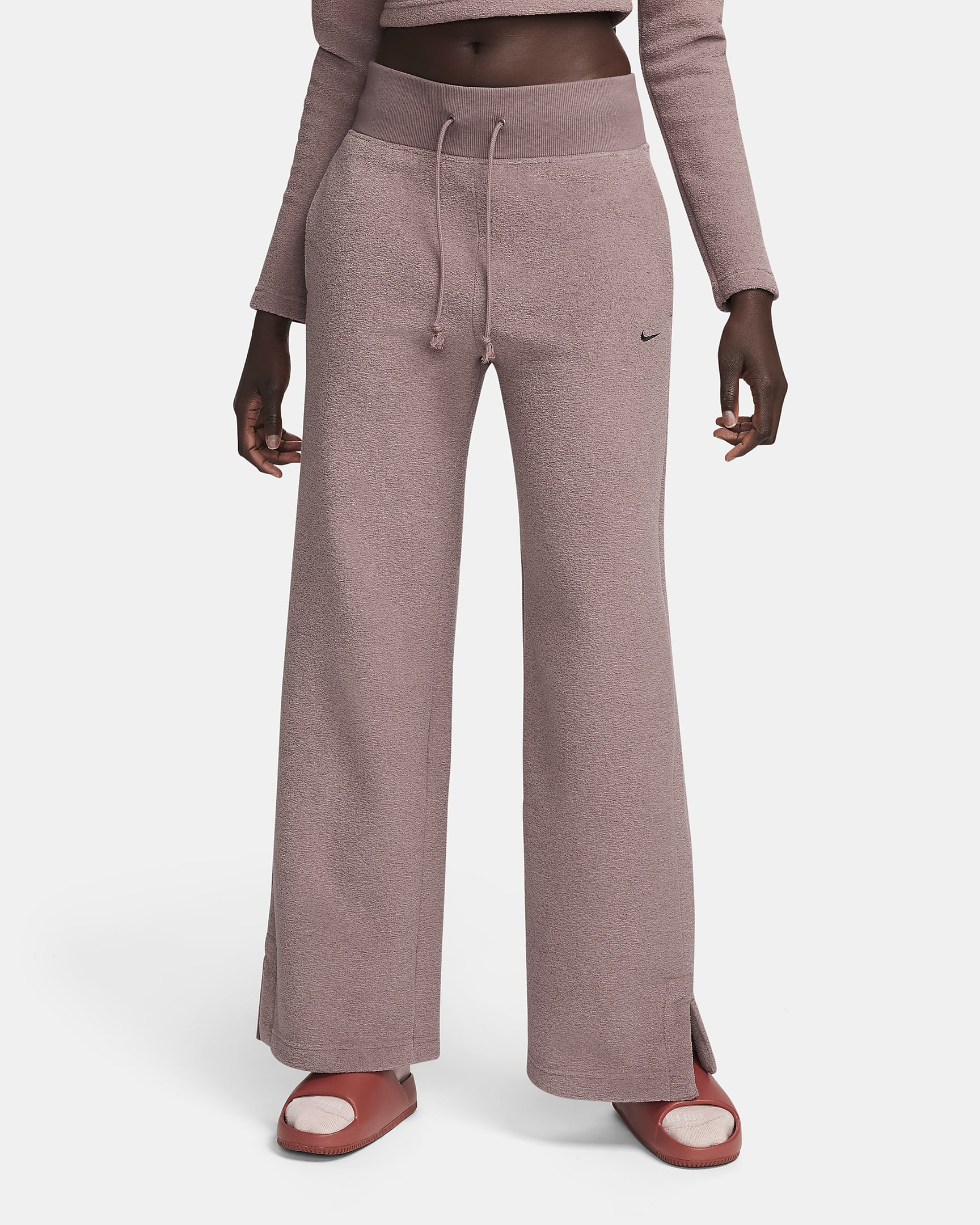 Pantaloni confortevoli in fleece a gamba larga e vita alta Nike Sportswear Phoenix Plush – Donna - Smokey Mauve/Nero