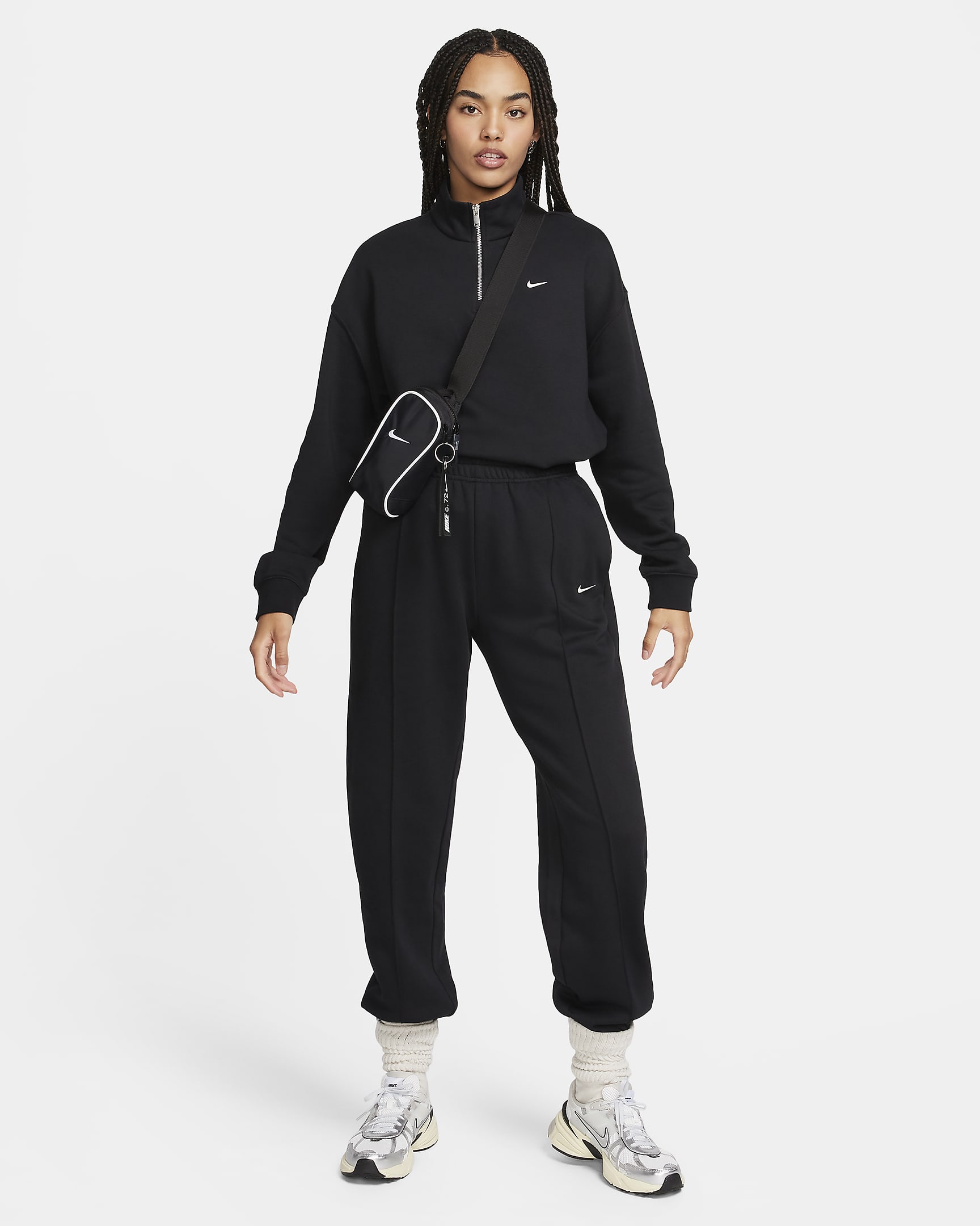 Nike Sportswear Women's Oversized 1/4Zip Fleece Top. Nike CA