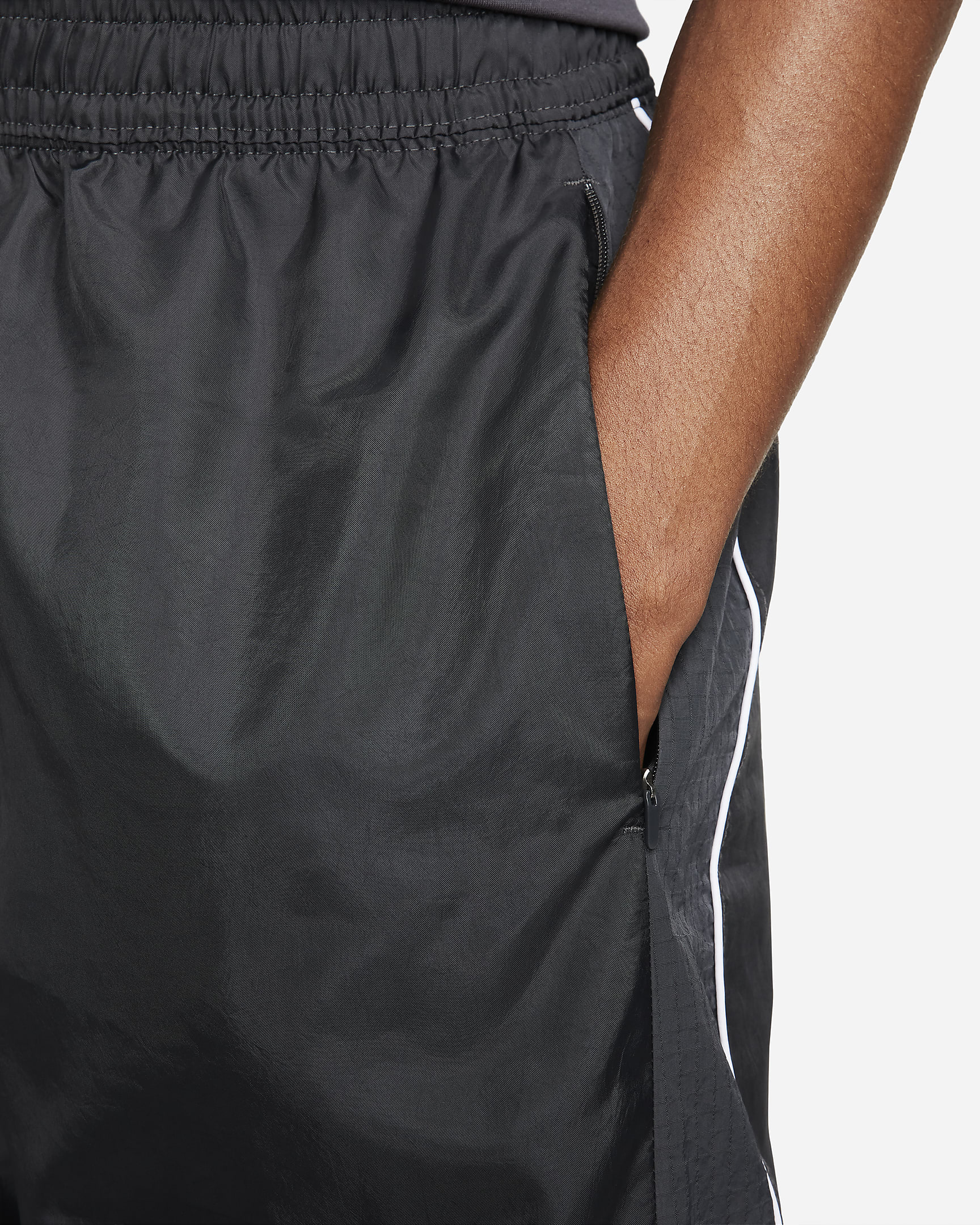 Nike Air x Marcus Rashford Men's Woven Trousers. Nike AT