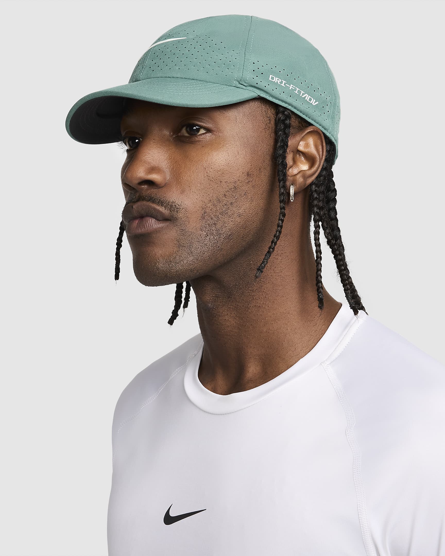 Nike Dri-FIT ADV Club Gorra de tenis sin estructura - Bicoastal/Barely Green