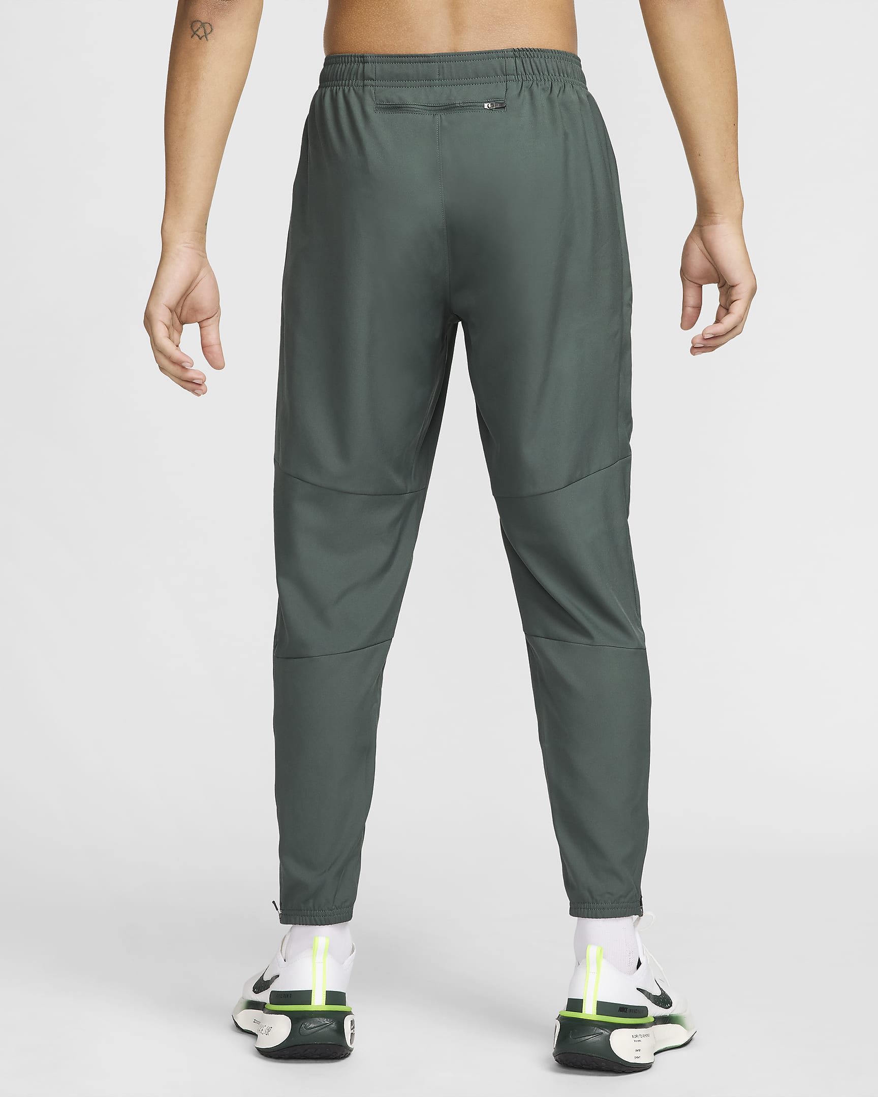 Pantaloni da running in tessuto Dri-FIT Nike Challenger – Uomo - Vintage Green/Nero