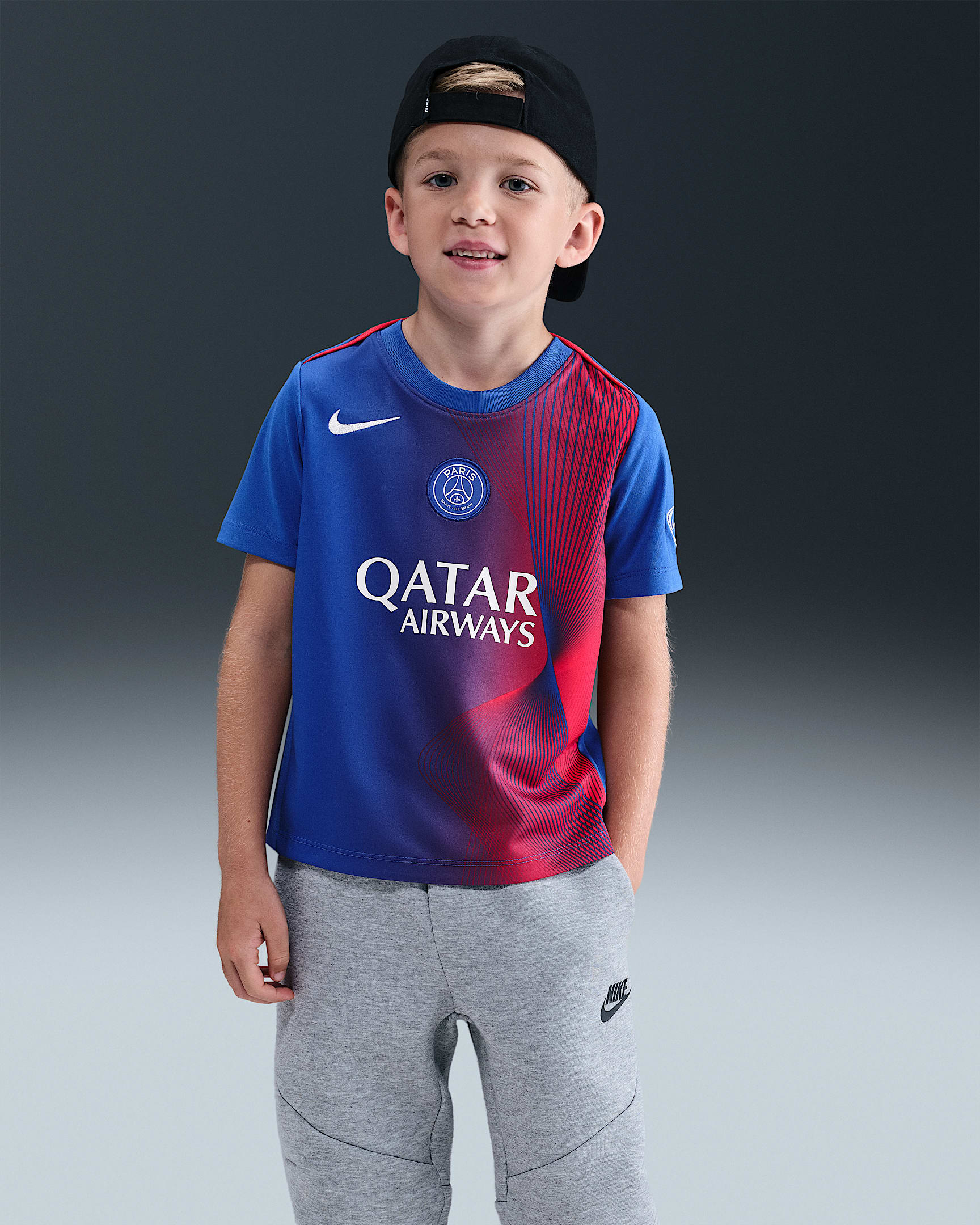 Paris Saint-Germain Academy Pro Third Younger Kids' Nike Dri-FIT Total 90 Football Pre-Match Short-Sleeve Top - Hyper Royal/Global Red/White