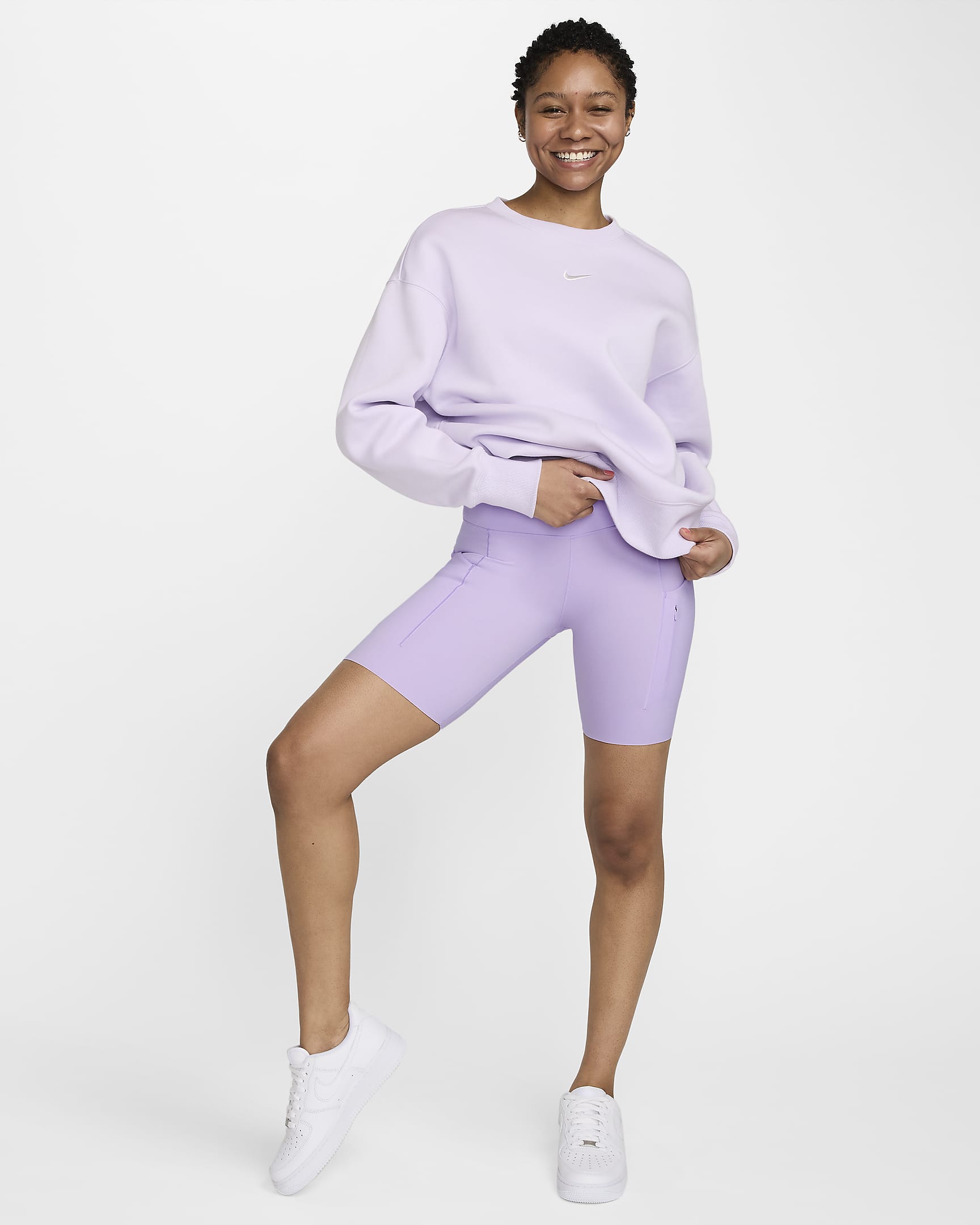 Nike Go Biker-Shorts mit starkem Halt, mittelhohem Bund und Taschen für Damen (ca. 20 cm) - Lilac Bloom/Schwarz