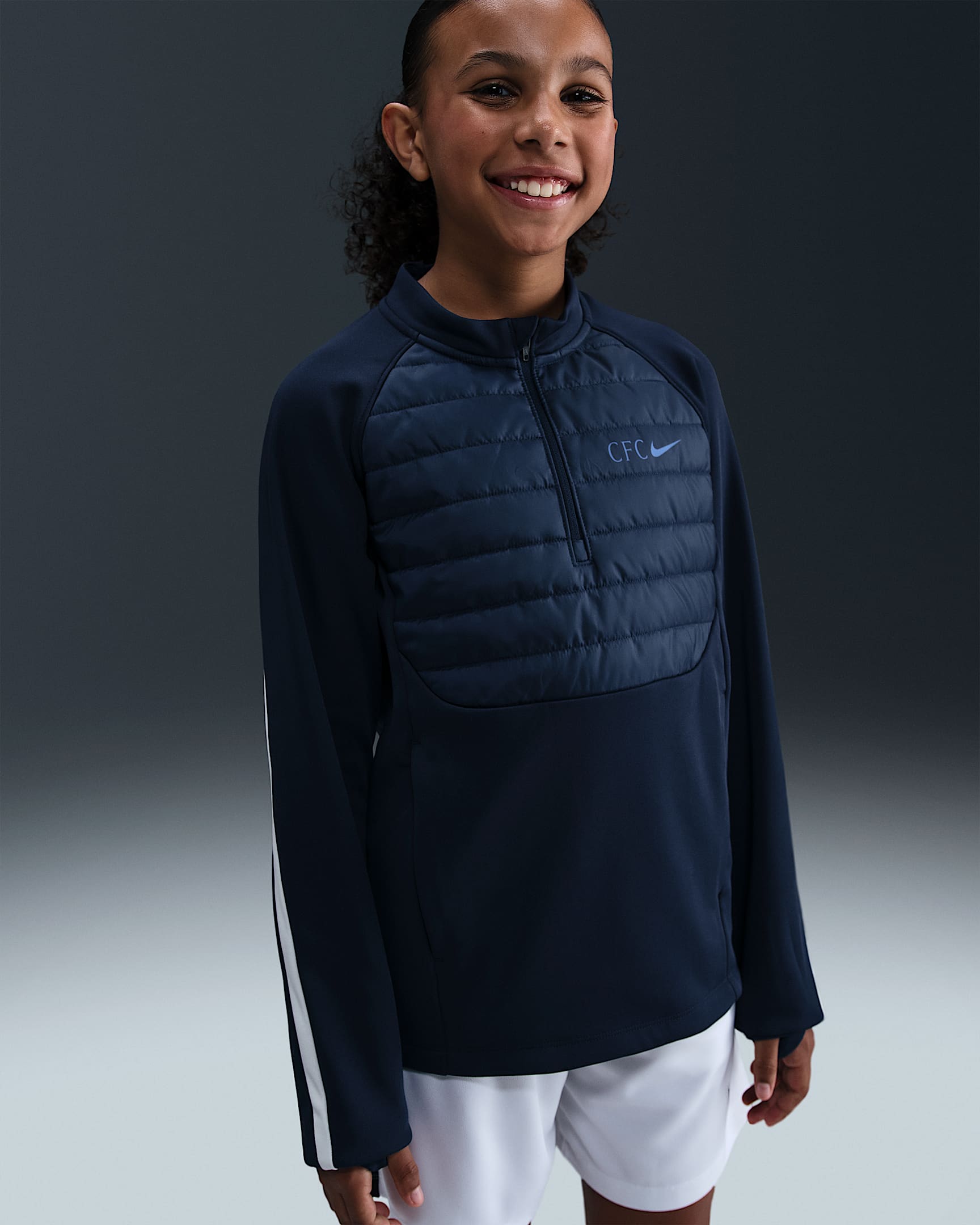 Chelsea F.C. Academy Winter Warrior Older Kids' Nike Therma-FIT Football Drill Top - Obsidian/Phantom/Rush Blue