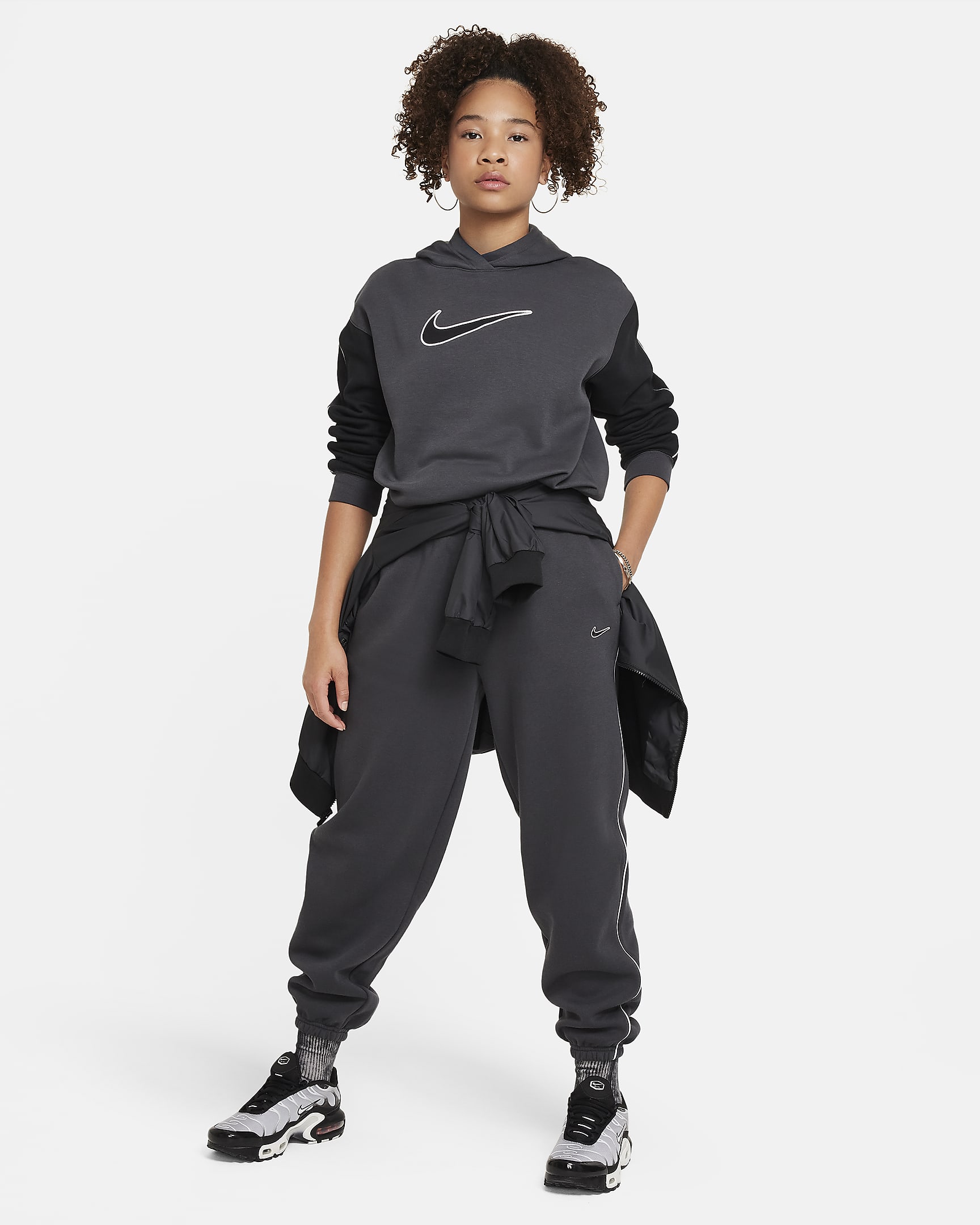 Volné flísové kalhoty Nike Sportswear pro větší děti (dívky) - Anthracite/Bílá