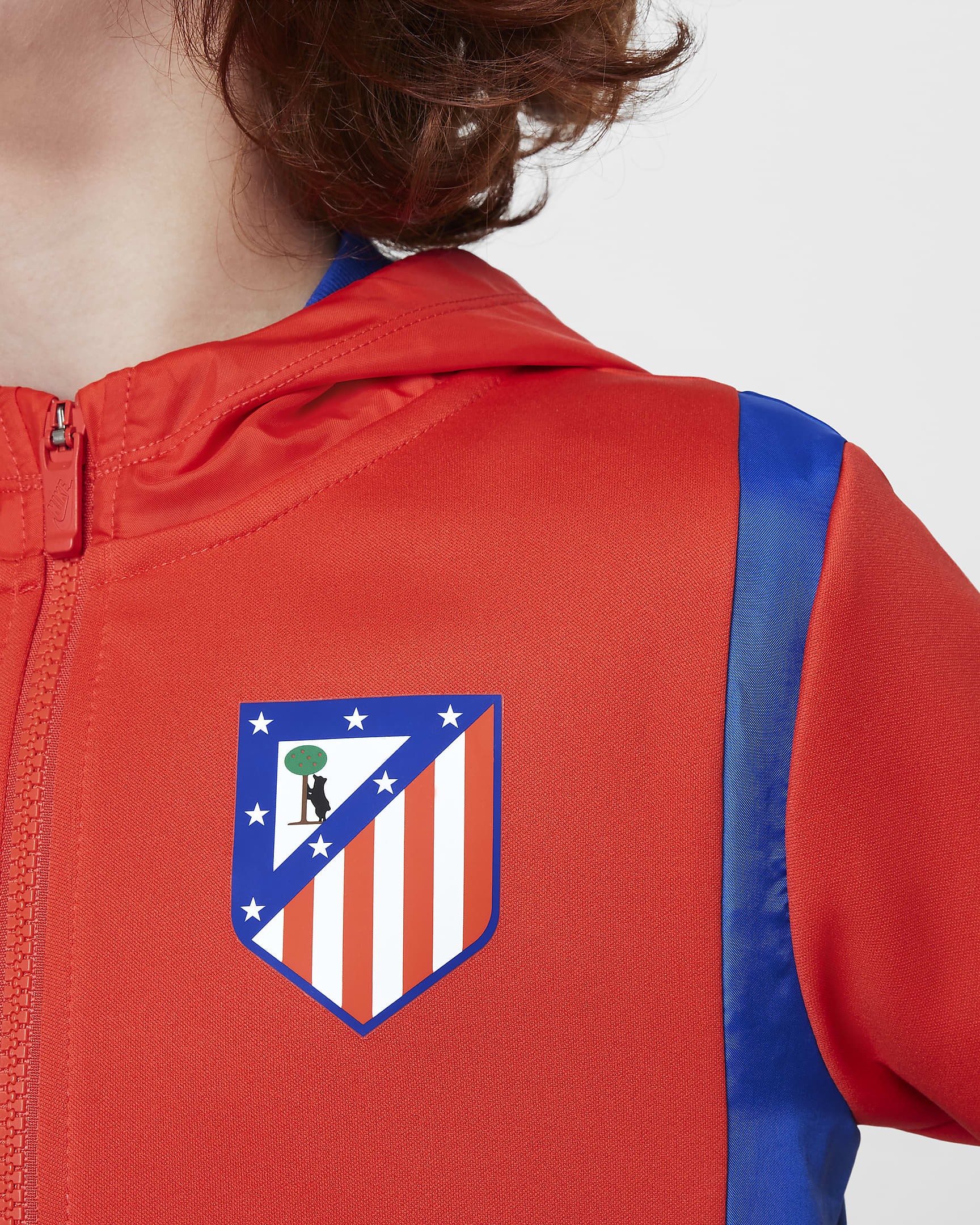 Atlético Madrid Home Older Kids' Nike Football Woven Tracksuit - Light Crimson/Game Royal/Game Royal