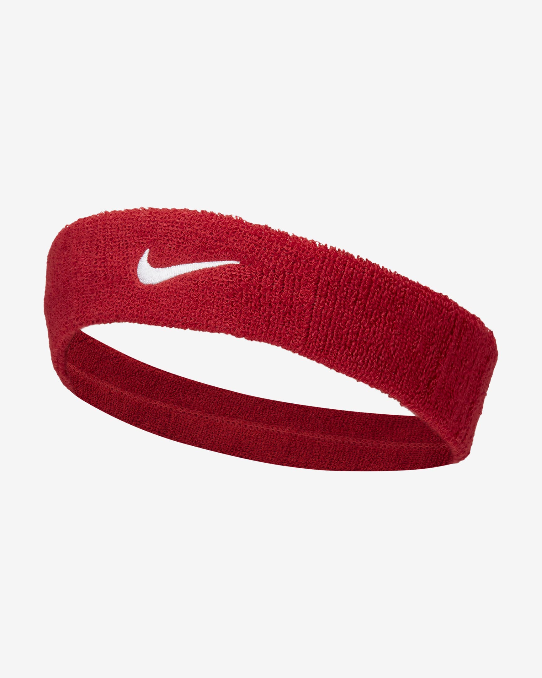 Cinta para el pelo Nike Swoosh. Nike.com