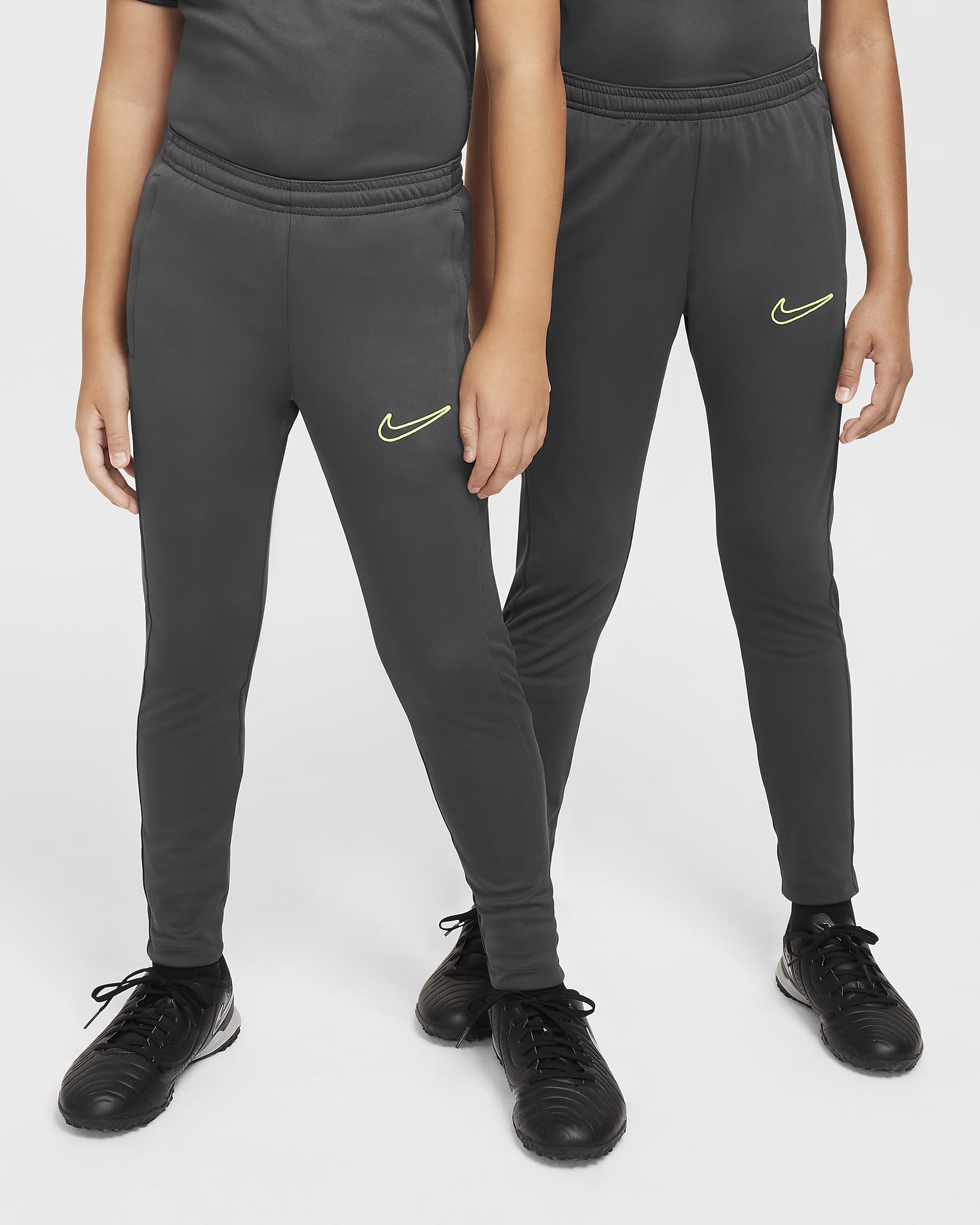 Nike Dri-FIT Academy23-fodboldbukser til børn - Anthracite/Anthracite/Anthracite/Volt