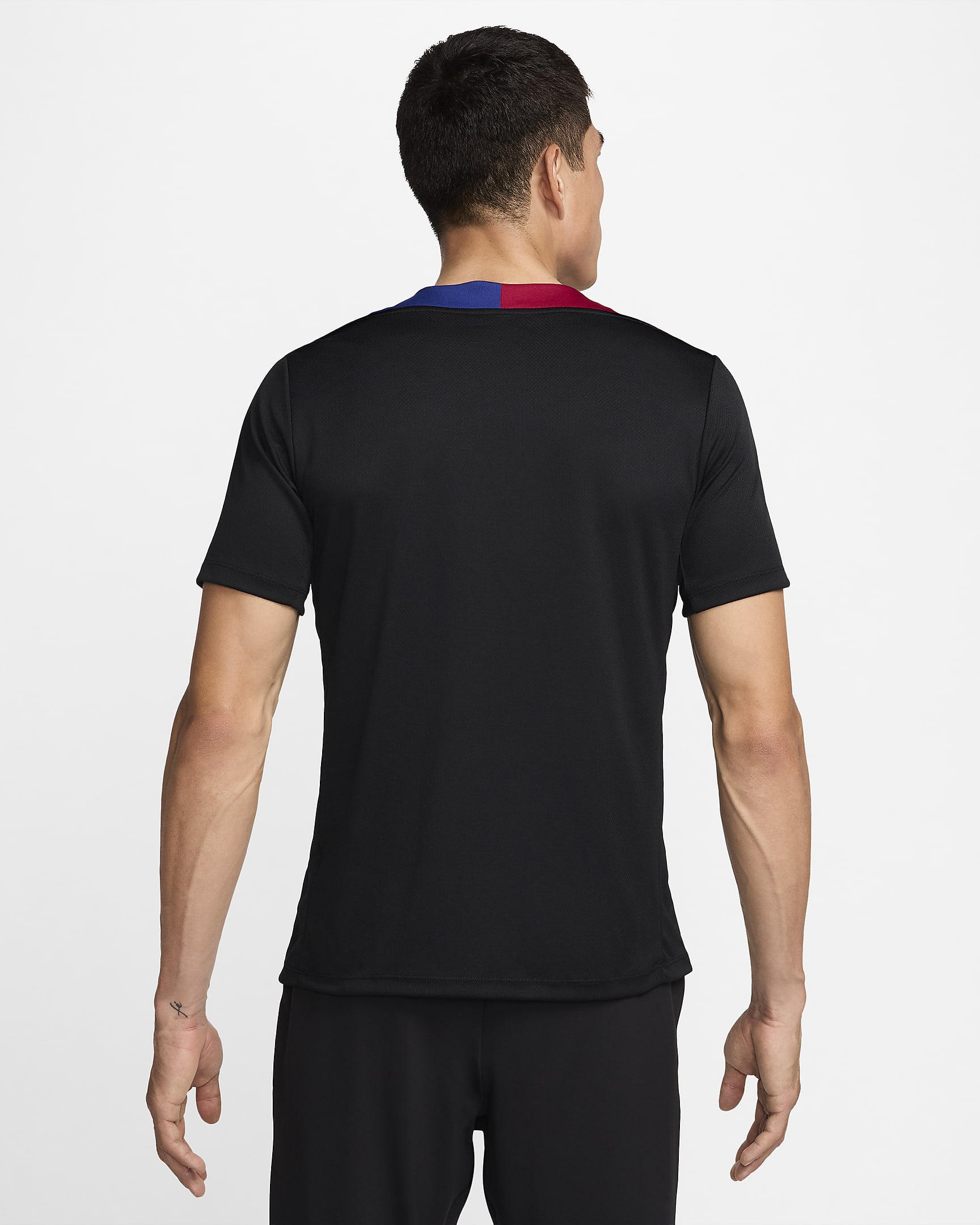 Pánské pleteninové fotbalové tričko Nike Dri-FIT FC Barcelona Strike s krátkým rukávem - Černá/Noble Red/Deep Royal Blue/Light Orewood Brown