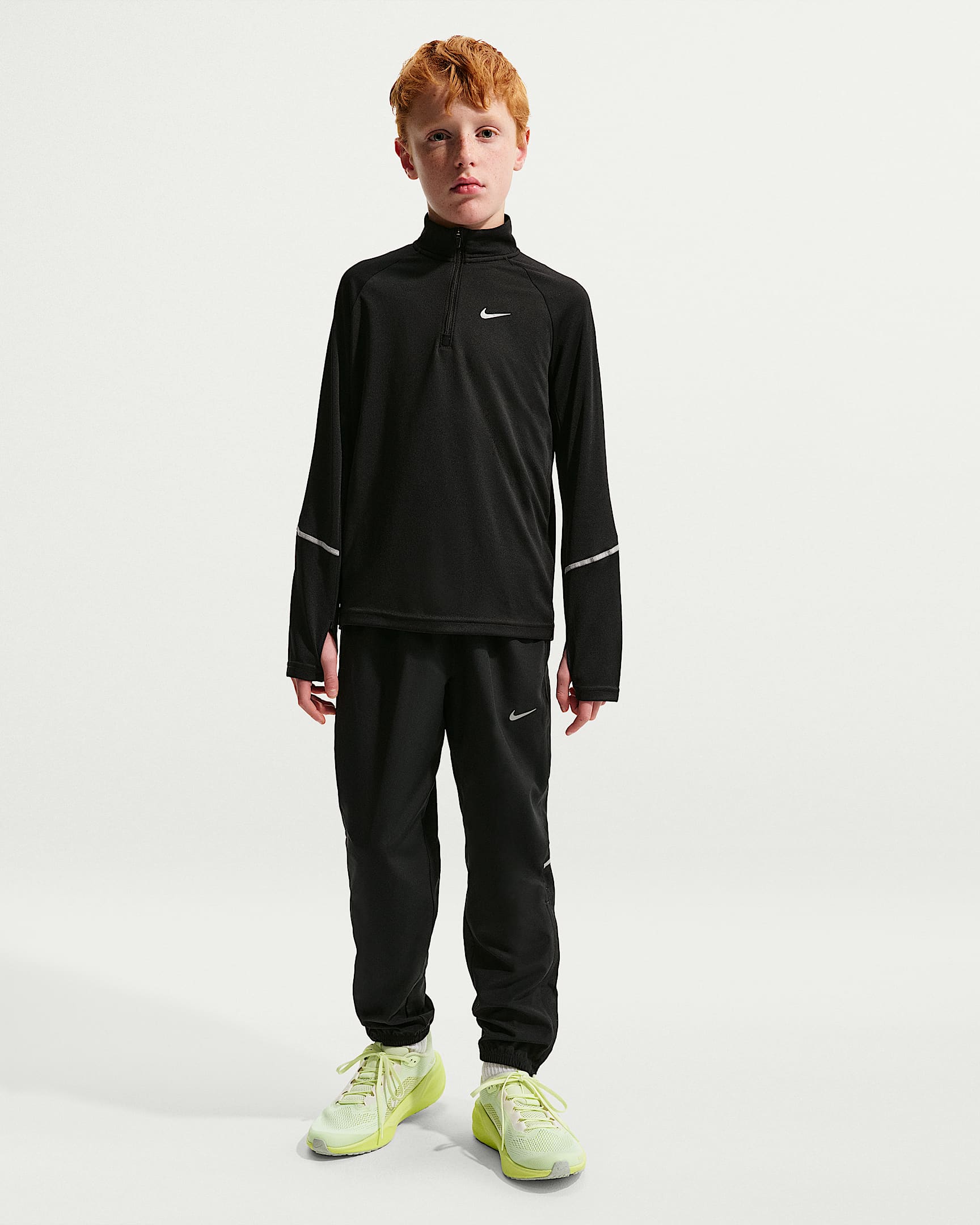 Nike Miler Older Kids' Dri-FIT Woven Trousers - Black