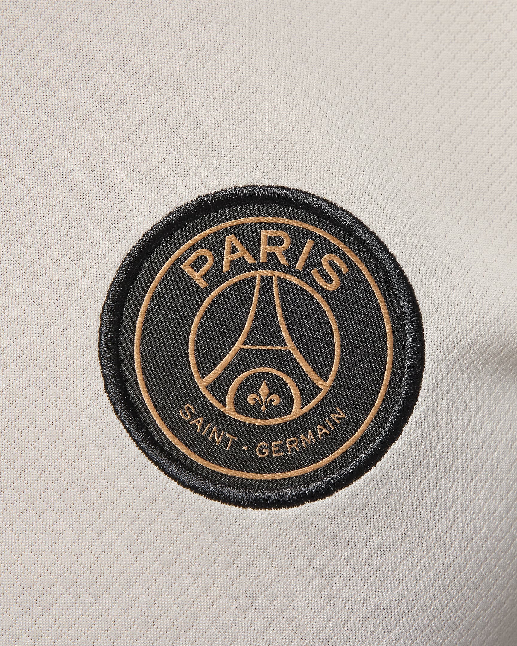 Męska koszulka piłkarska z dzianiny z krótkim rękawem Jordan Dri-FIT Paris Saint-Germain Strike (wersja trzecia) - Pale Ivory/Pale Ivory/Rust Pink/Czerń