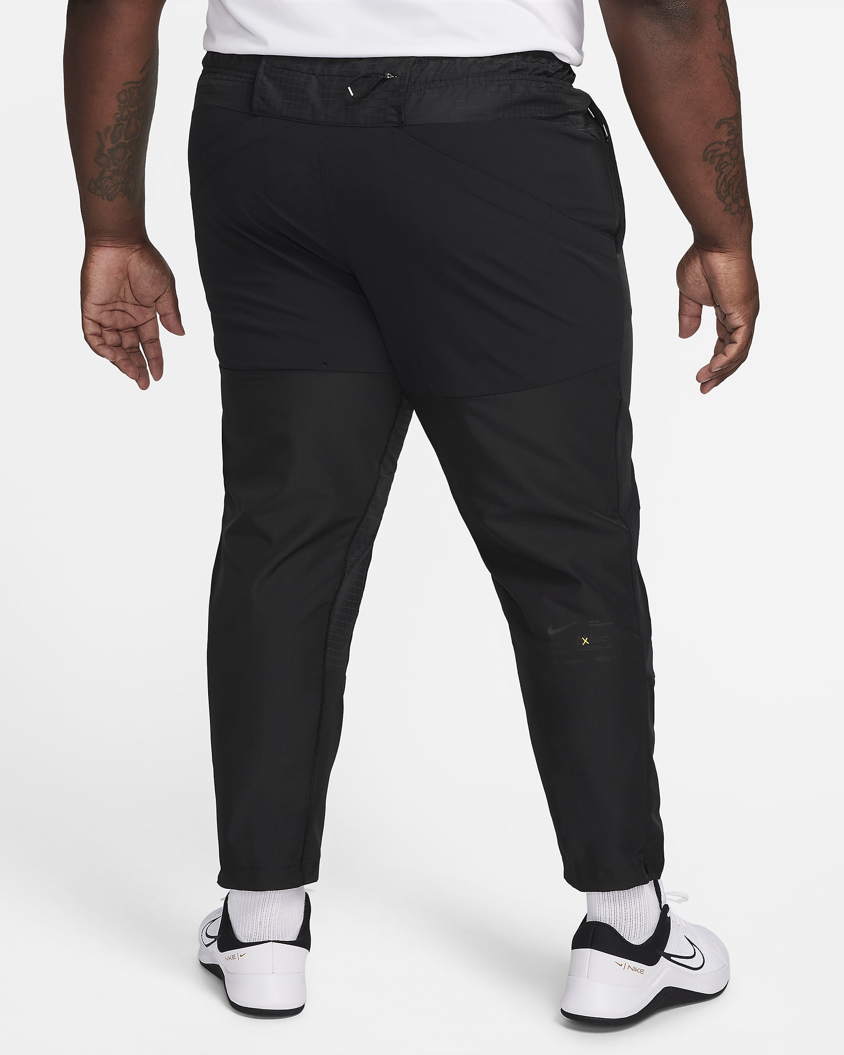 Nike APS Men's Dri-FIT ADV Woven Versatile Trousers. Nike NL