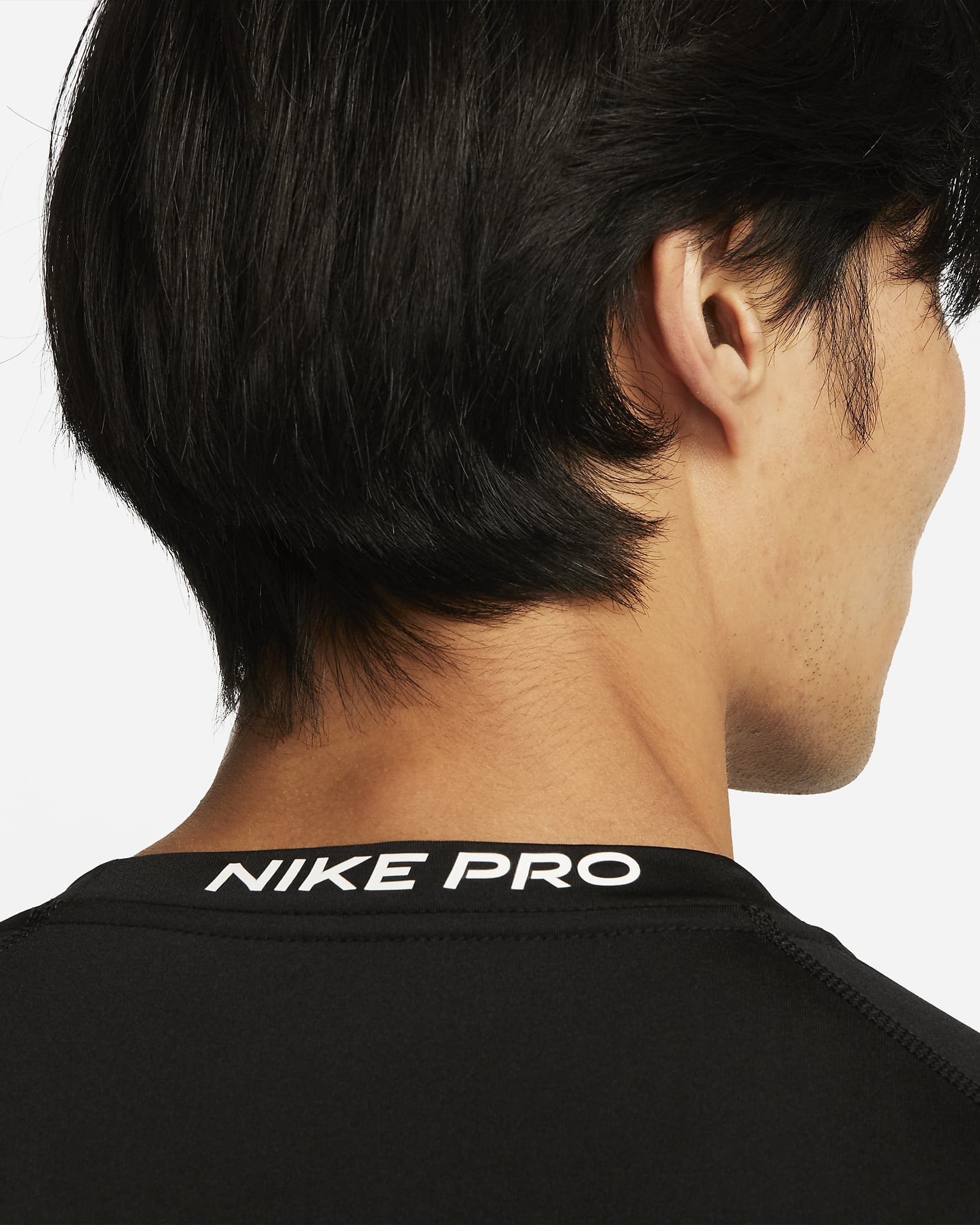 Nike Pro Dri-FIT strakke fitnesstop met lange mouwen voor heren - Zwart/Wit