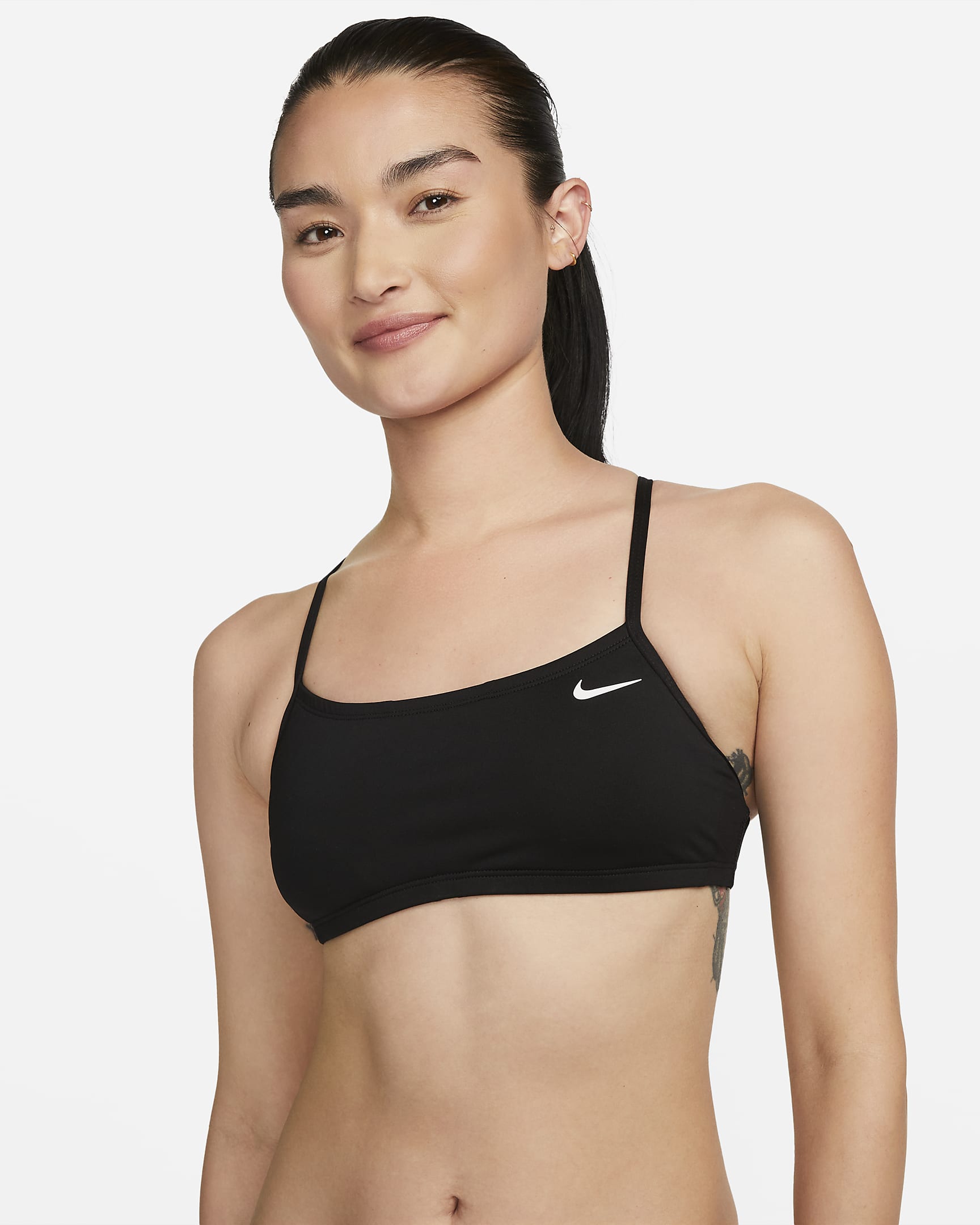 Prenda superior de bikini con espalda deportiva Nike Essential - Negro