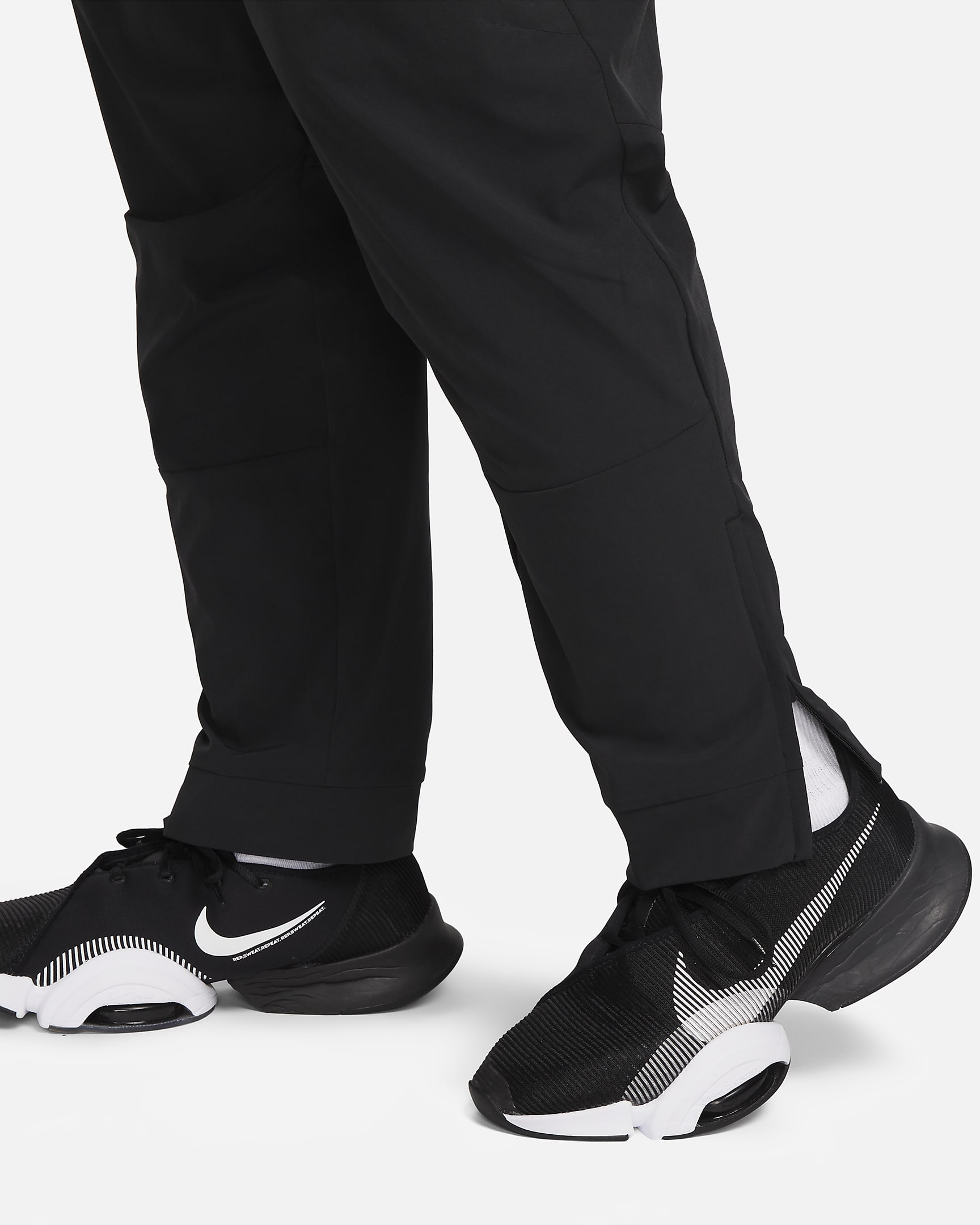 Nike Unlimited Men's Dri-FIT Zip Cuff Versatile Trousers - Black/Black/Black