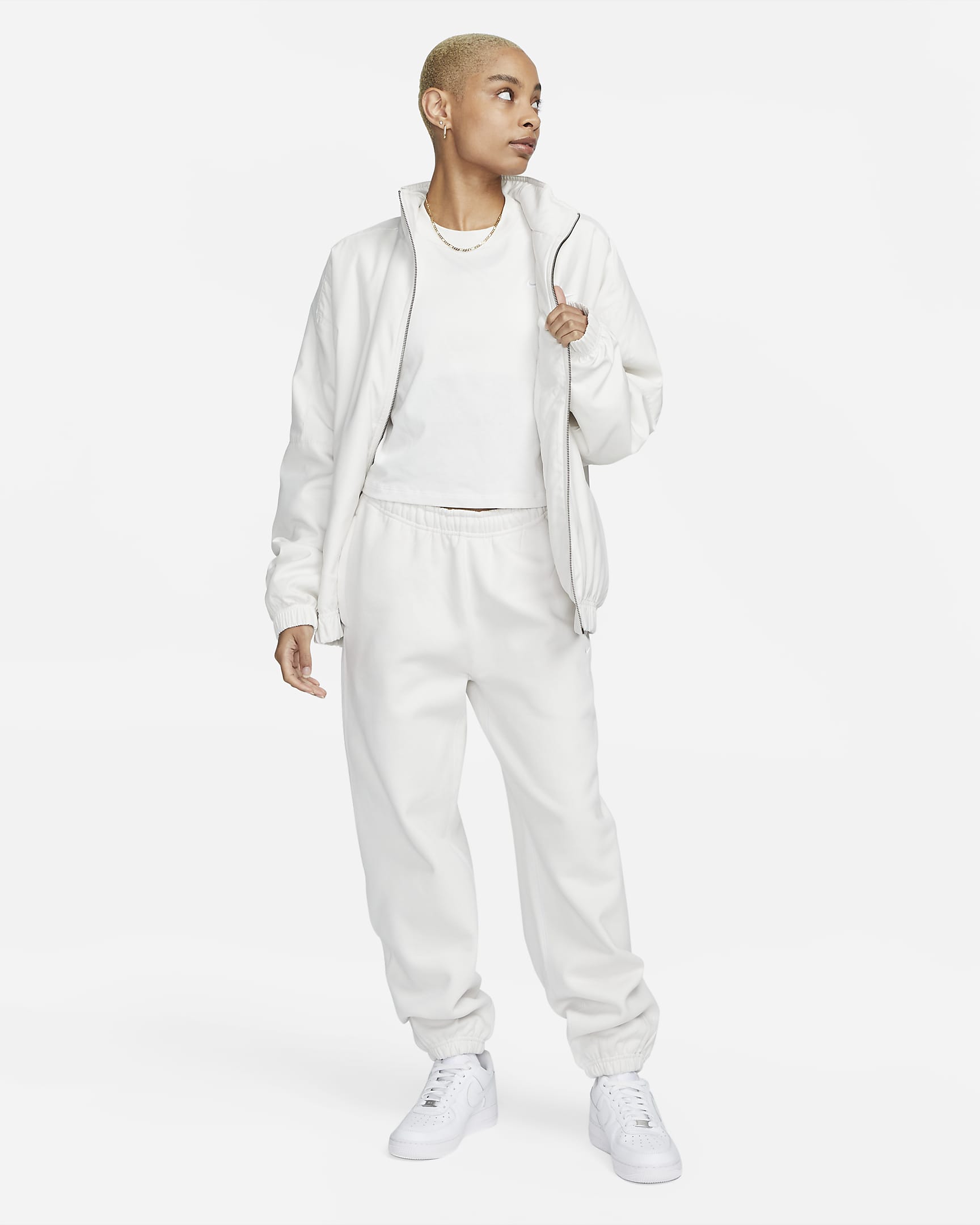 Pantalon en tissu Fleece Nike Solo Swoosh pour Femme - Phantom/Blanc
