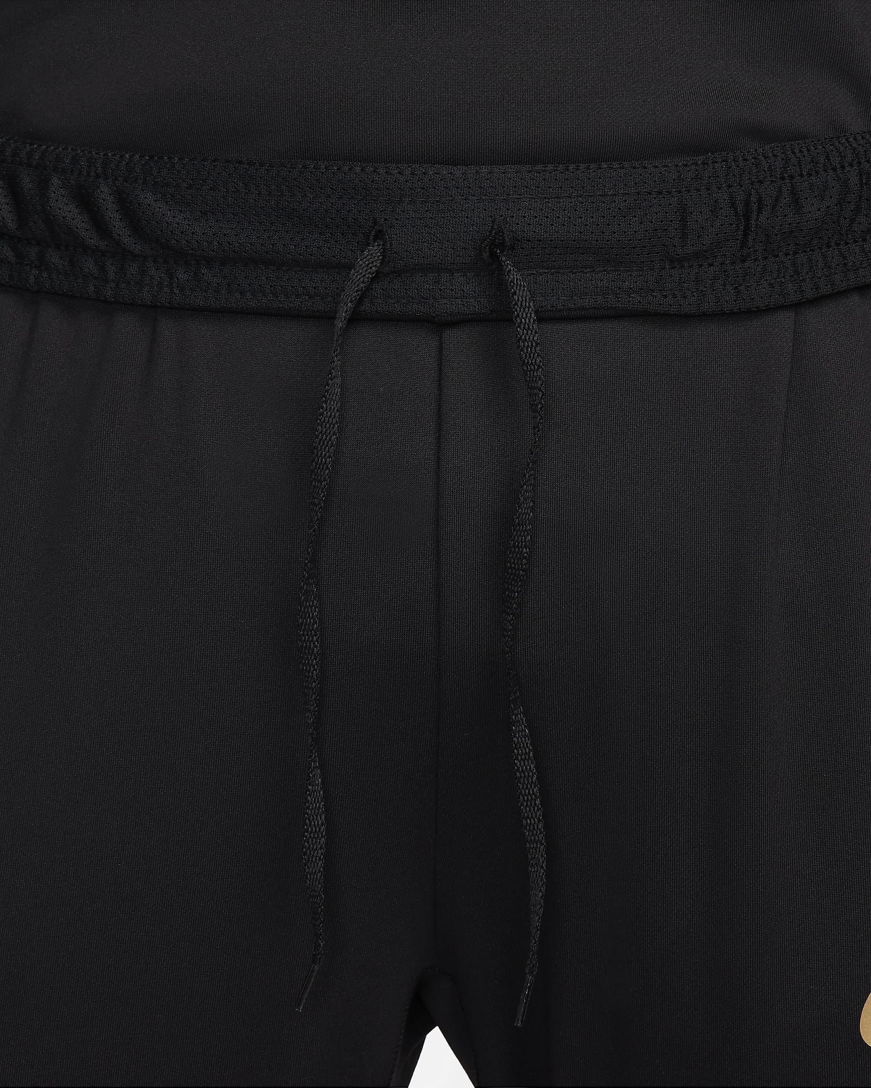 Nike Strike Pantalón de fútbol Dri-FIT - Mujer - Negro/Jersey Gold/Oro metalizado