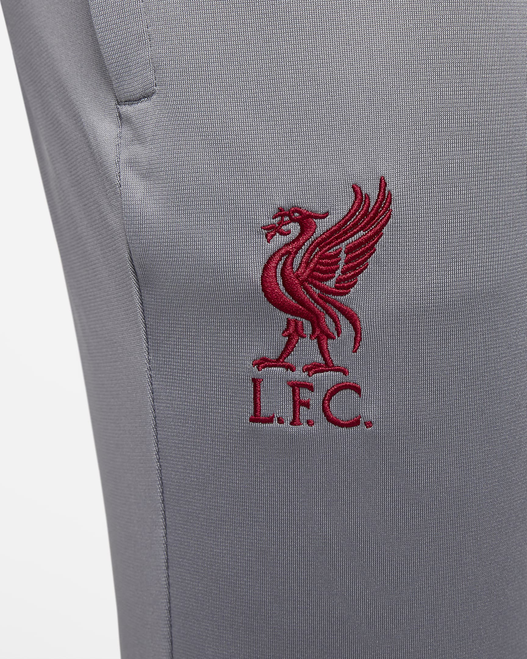 Liverpool F.C. Strike Men's Nike Dri-FIT Hooded Tracksuit. Nike HR