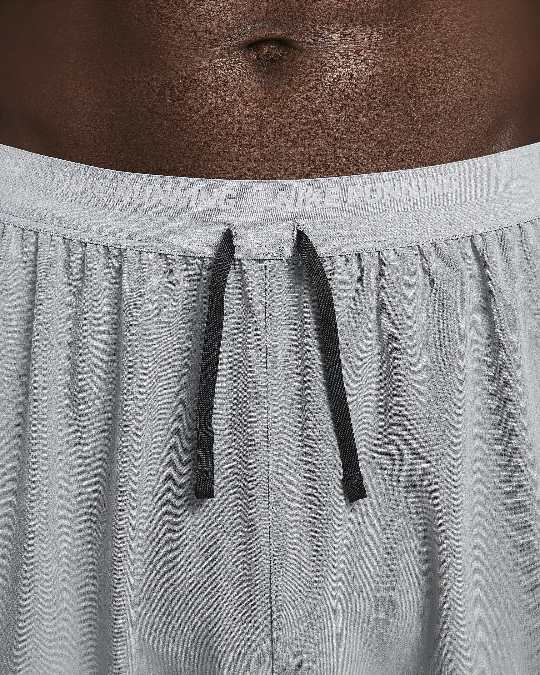 Calças de running entrançadas Dri-FIT Nike Phenom para homem - Cinzento Smoke