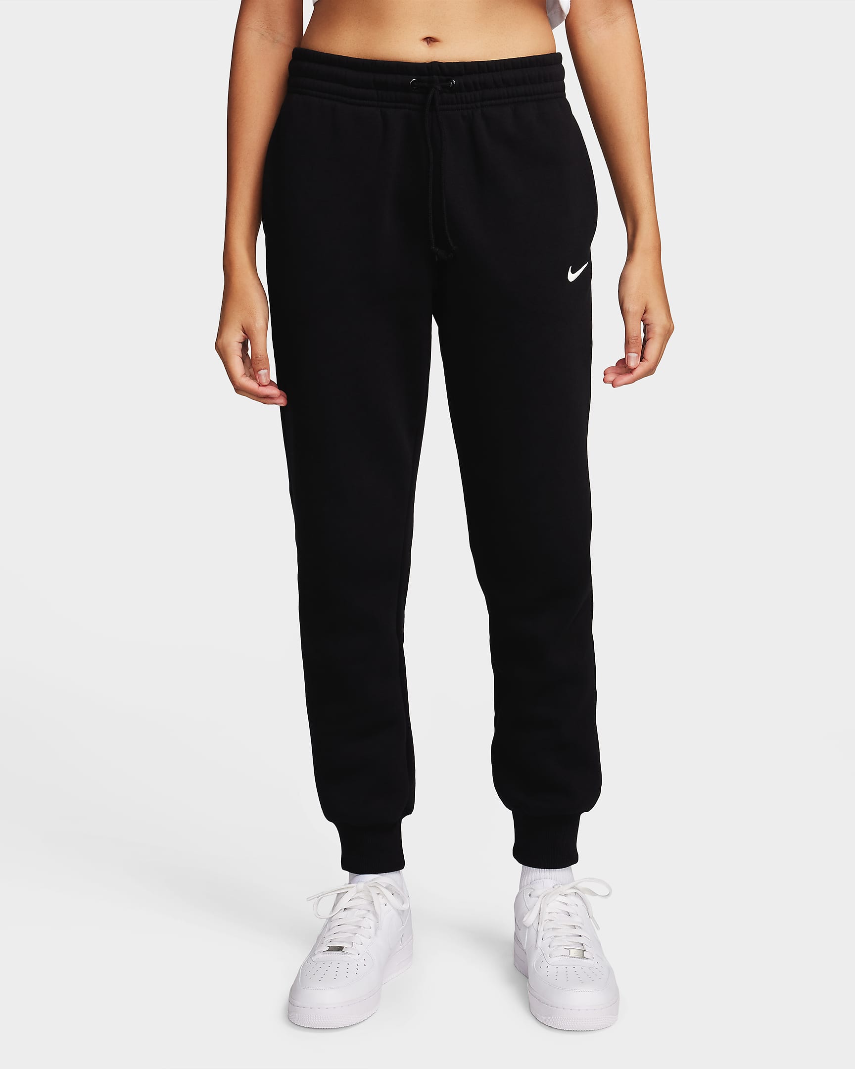 Pantaloni tuta a vita media Nike Sportswear Phoenix Fleece – Donna - Nero/Sail