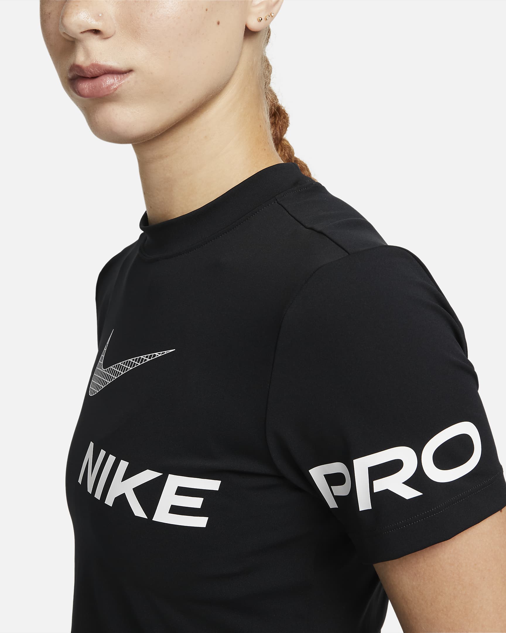 Kortärmad, kort träningströja Nike Pro Dri-FIT med tryck för kvinnor - Svart/Vit