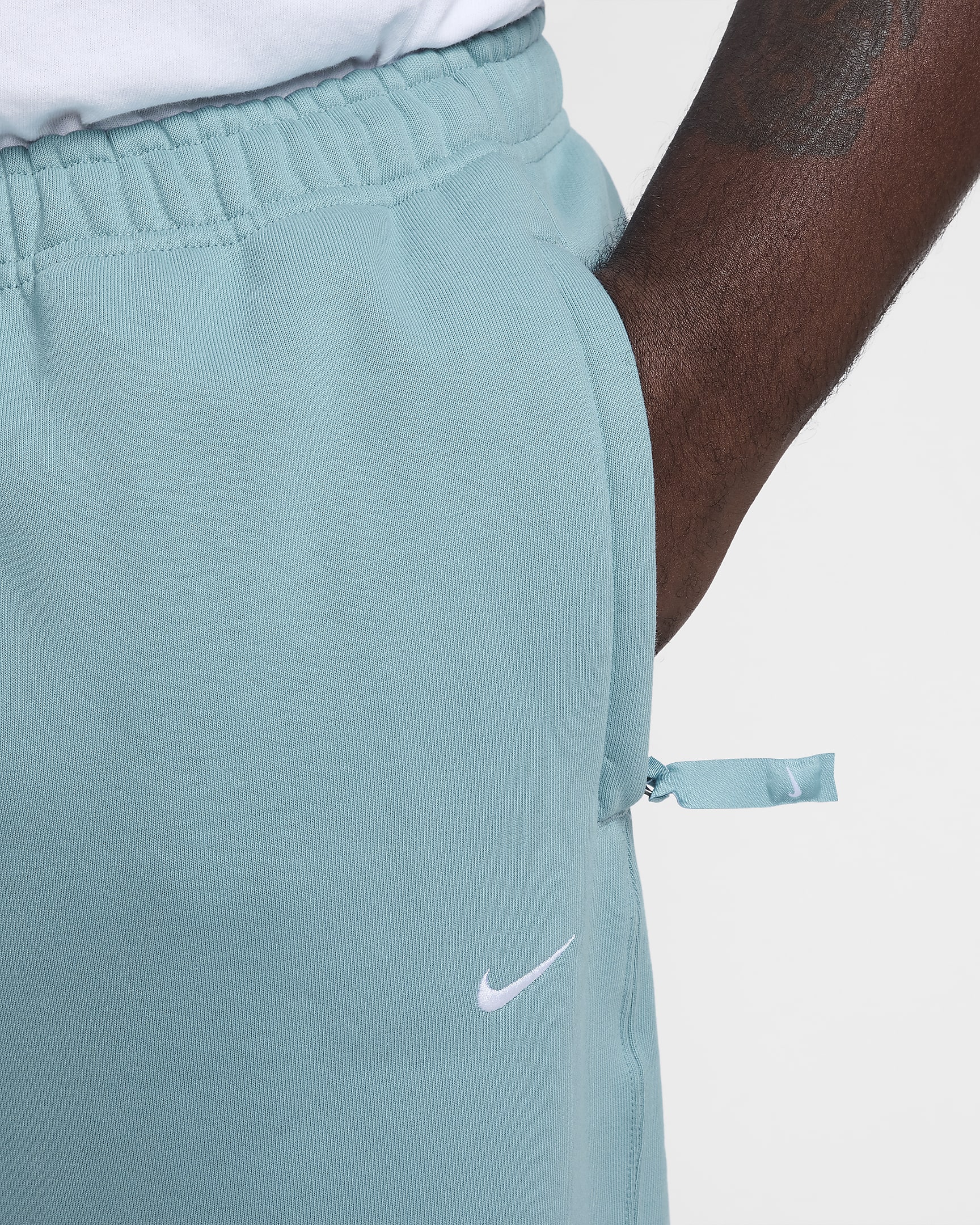 Nike Solo Swoosh Men's Fleece Trousers - Denim Turquoise/White