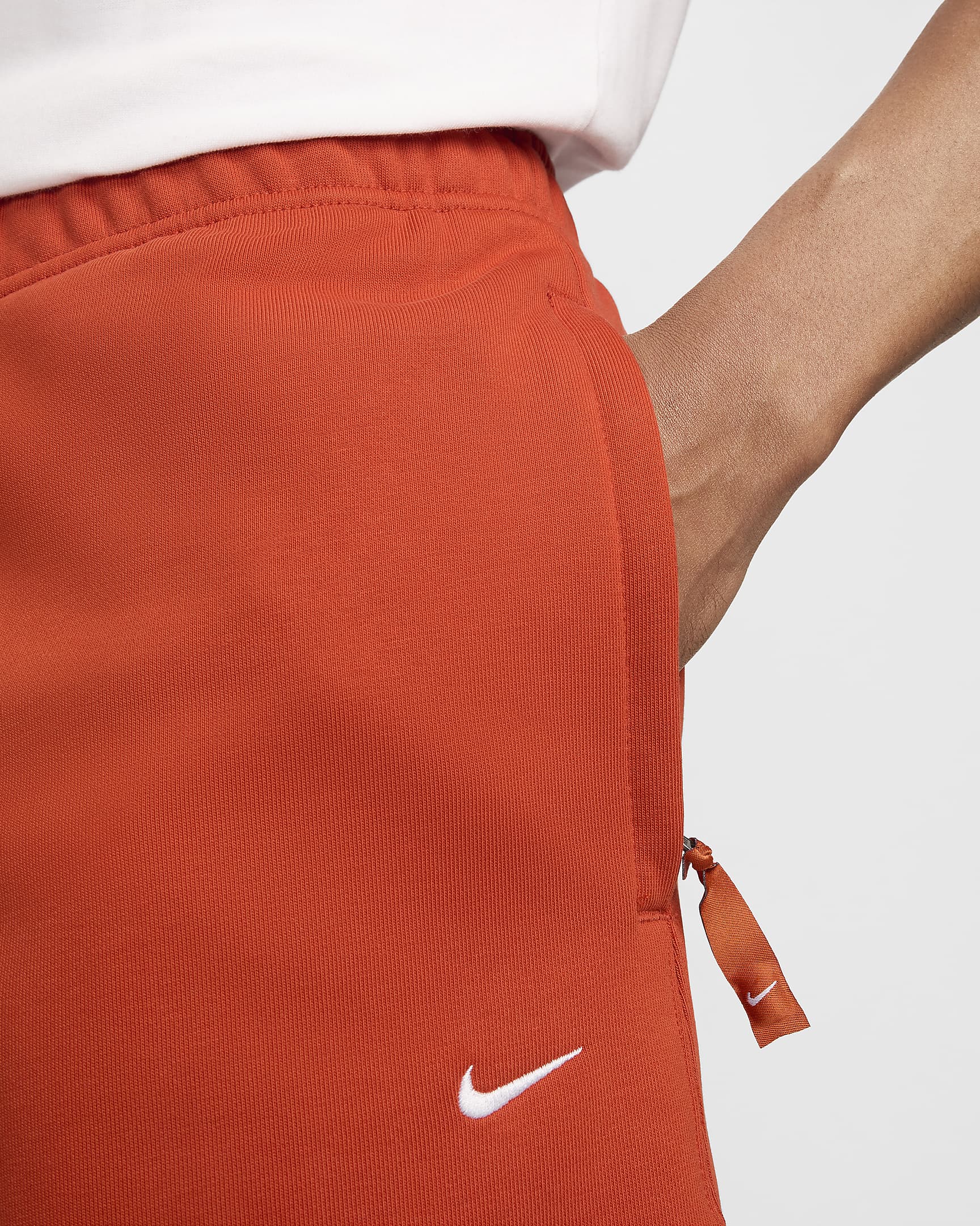 Nike Solo Swoosh Fleece-Hose für Herren - Dragon Red/Weiß