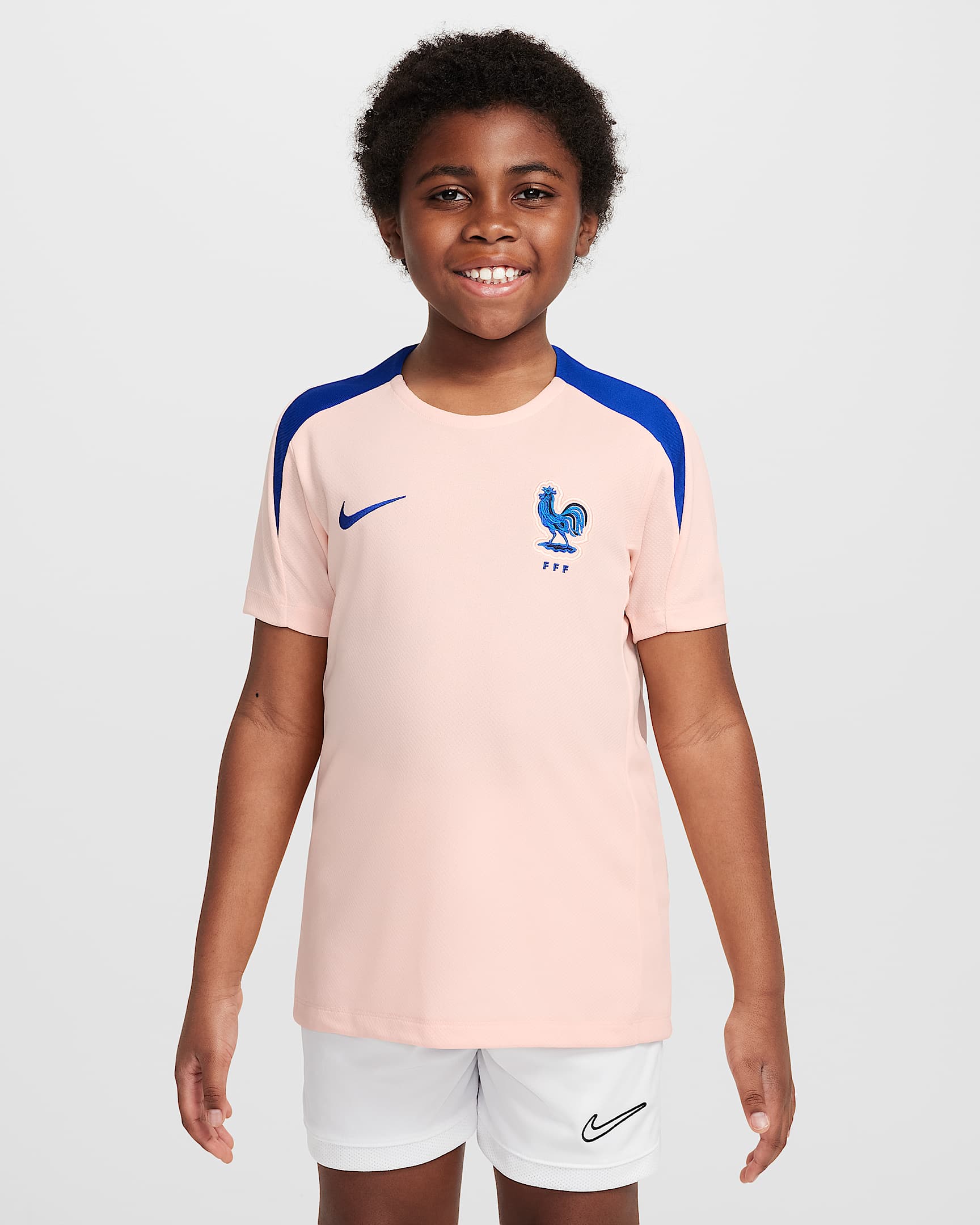FFF Strike Older Kids' Nike Dri-FIT Football Short-Sleeve Top - Washed Coral/Bright Blue/Bright Blue
